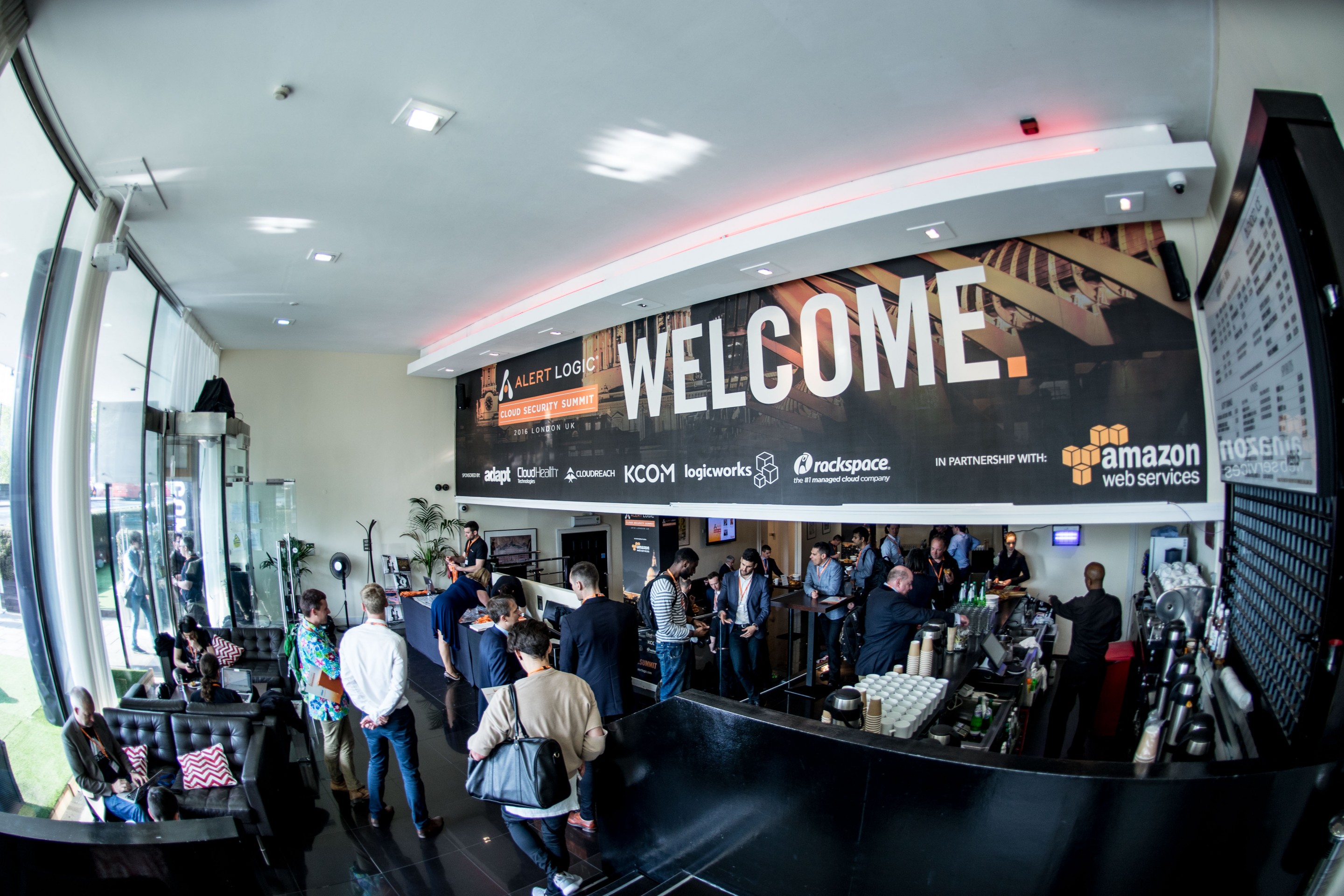 Millbank Media Centre reception with "WELCOME" banner for an engaging networking event.