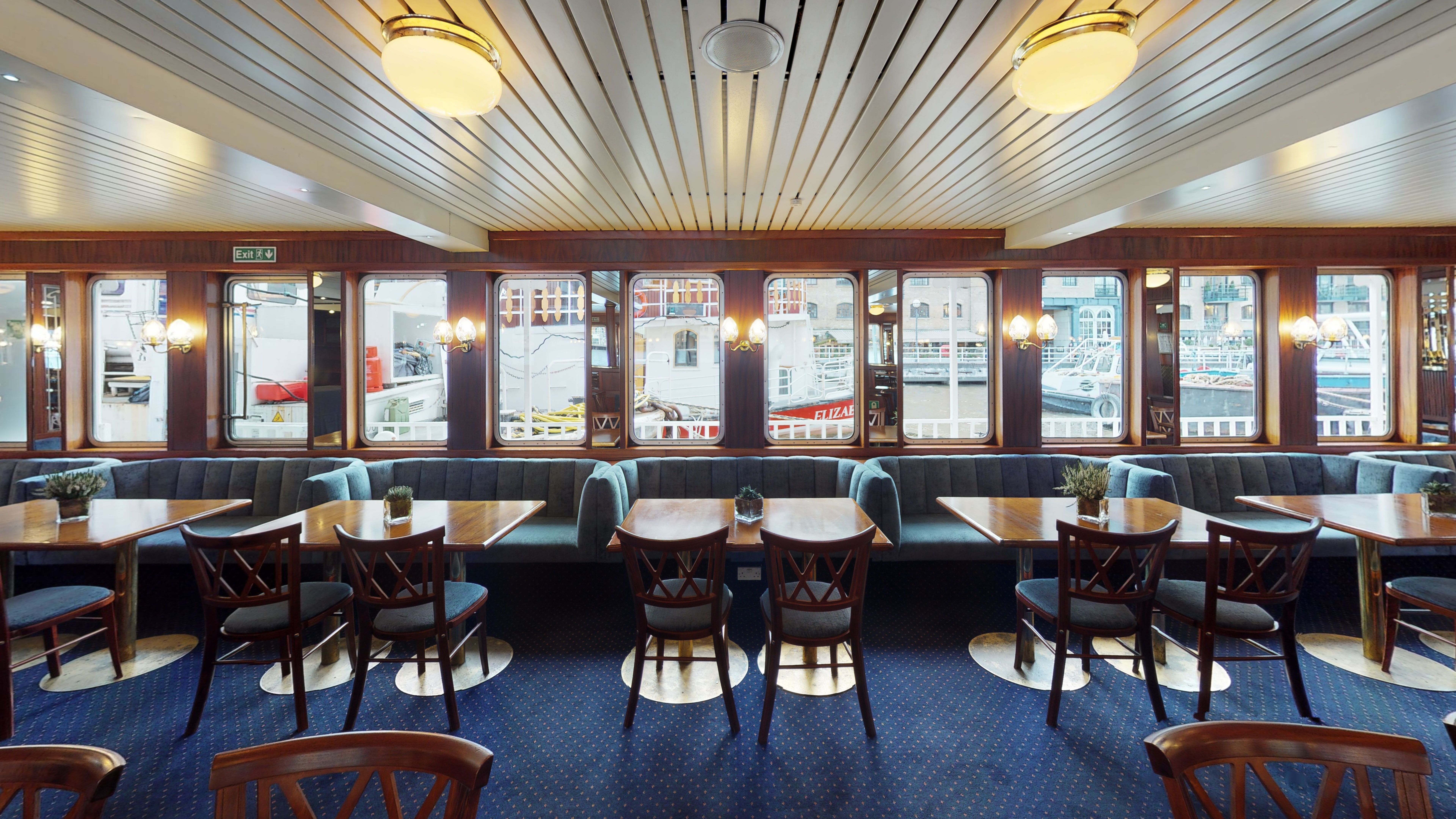 Whole Venue in Dixie Queen: inviting waterfront dining space with nautical decor for events.