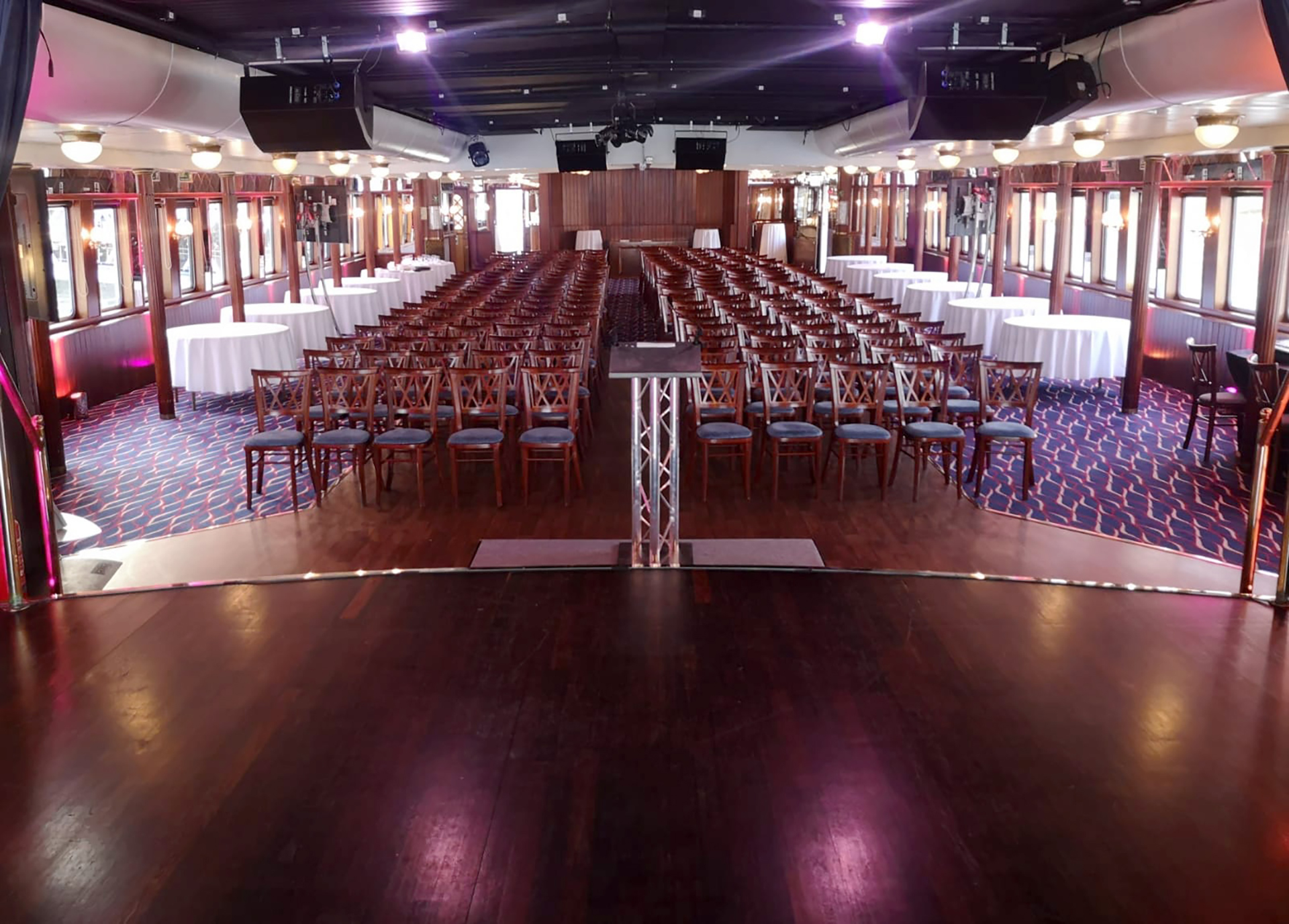 Event space in Dixie Queen with chairs and tables, ideal for conferences and corporate events.
