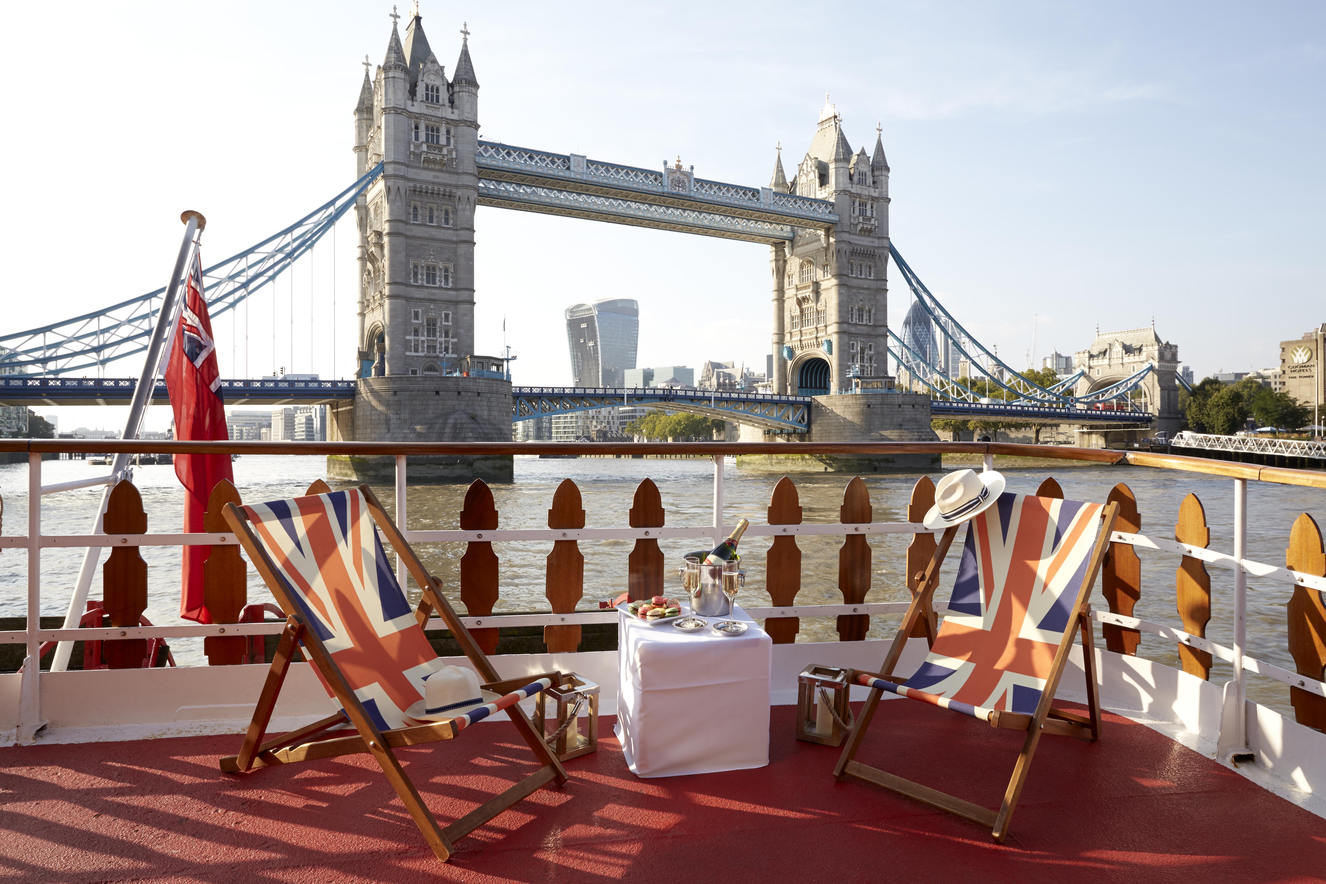 Outdoor venue in Elizabethan with Union Jack deck chairs, ideal for corporate events.