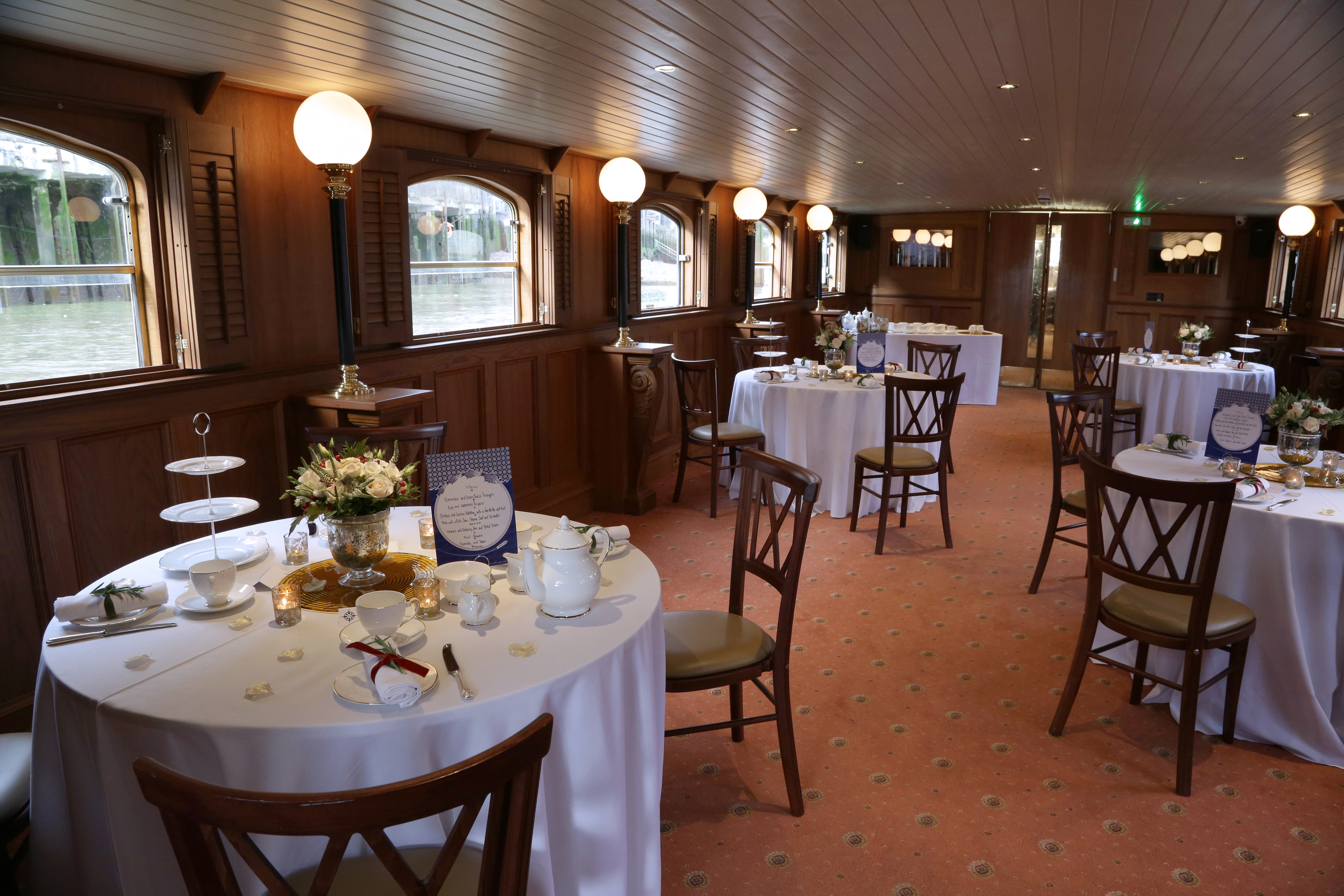 Elegant Edwardian venue with fine linens, ideal for upscale meetings and intimate gatherings.
