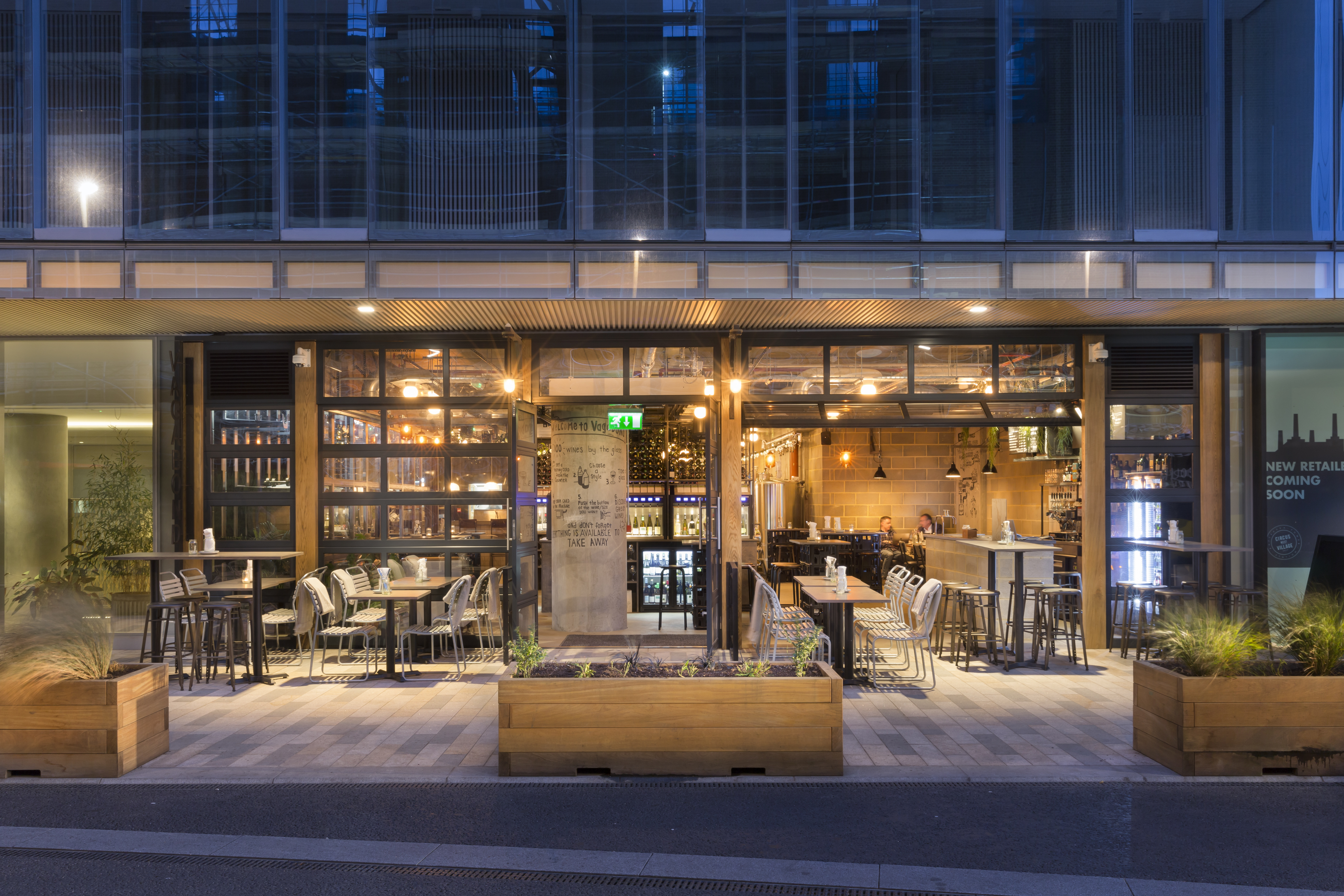 Modern Urban Winery at Battersea Power Station with inviting glass windows for events.