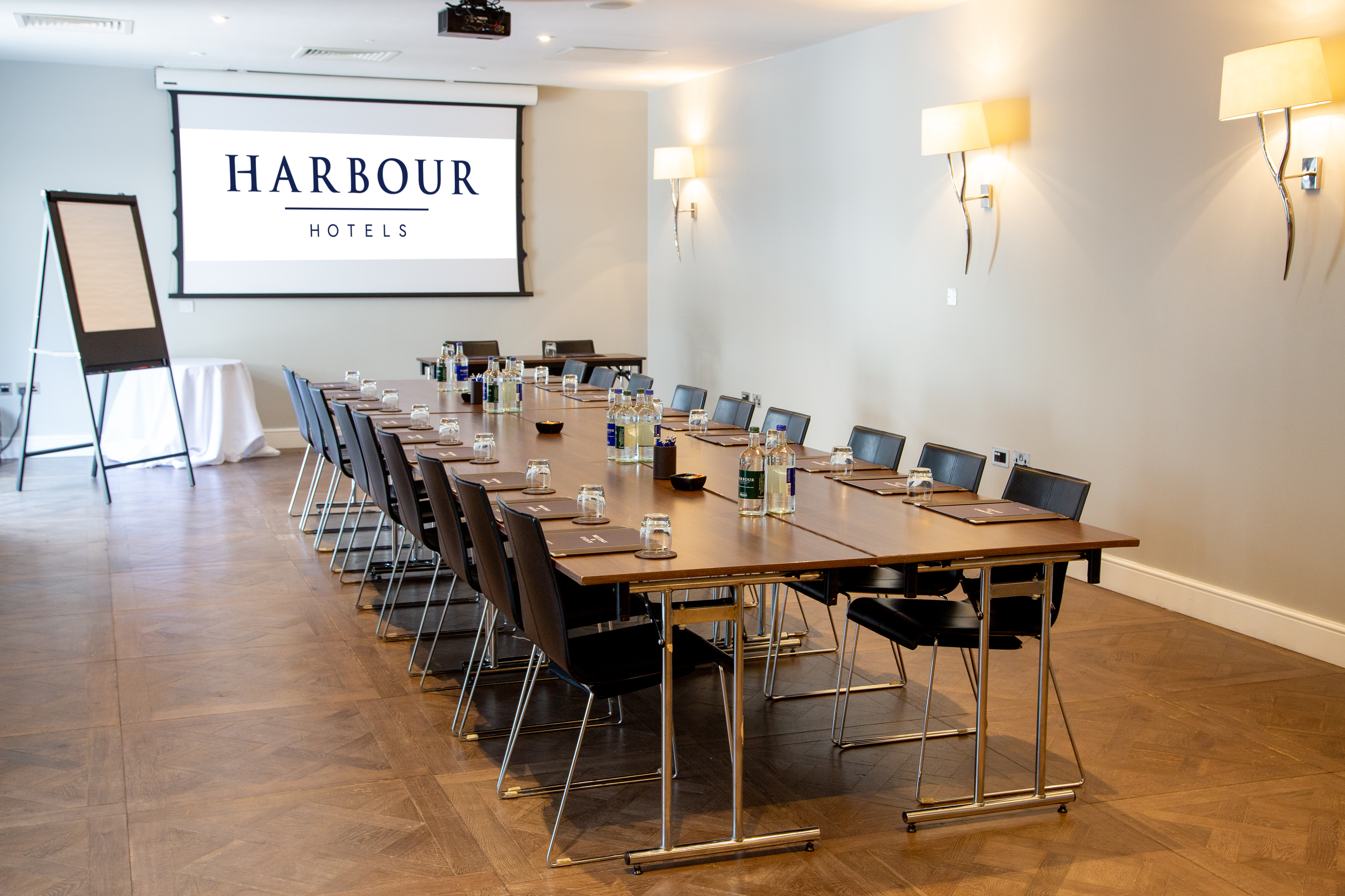 Harbour Suite 1 meeting room with conference table, ideal for corporate events and workshops.