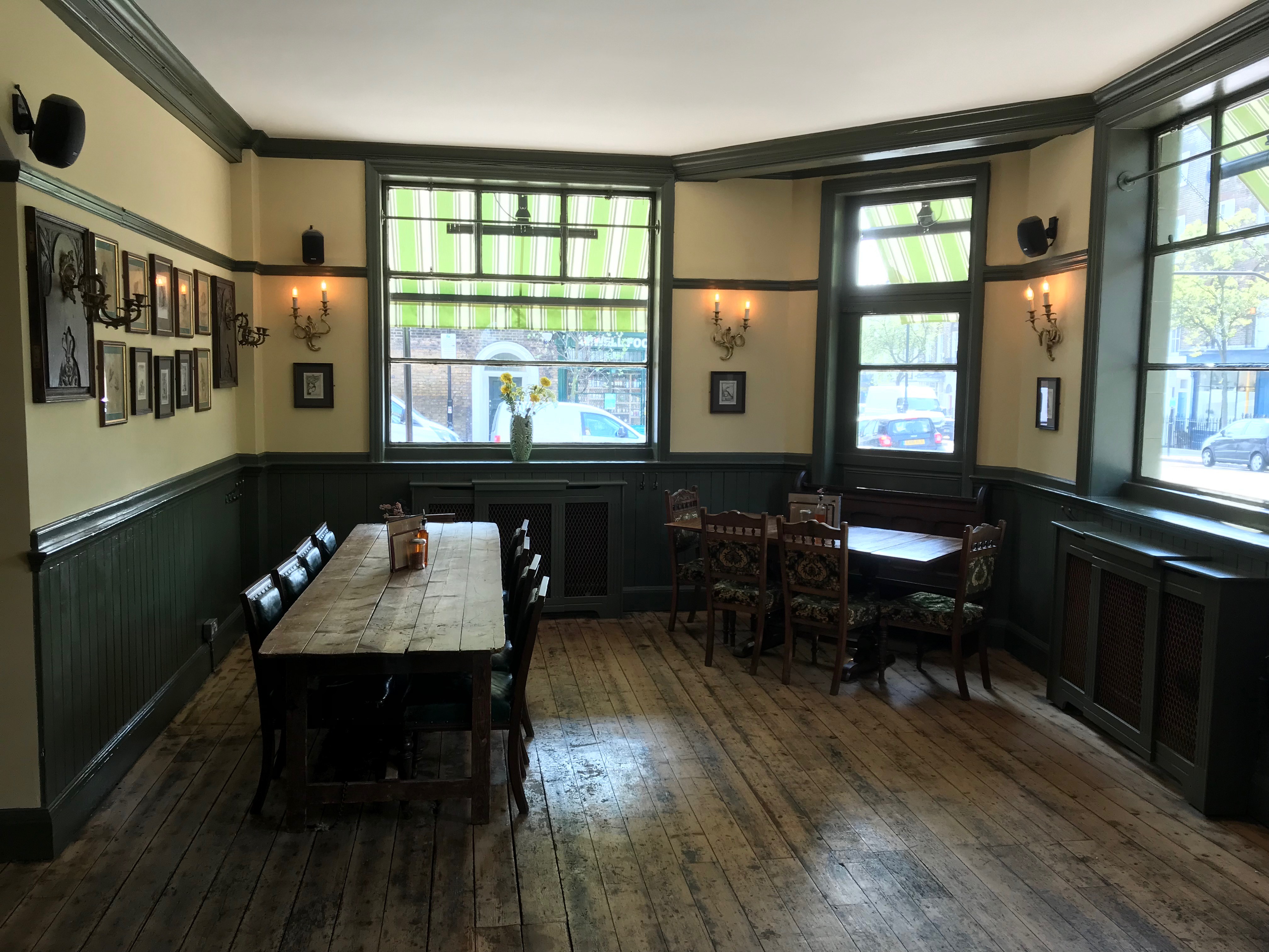 Cozy Bar Room at The George and Monkey, perfect for meetings and workshops.