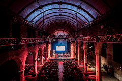 Roxy Central event space with audience engaged in a corporate presentation.