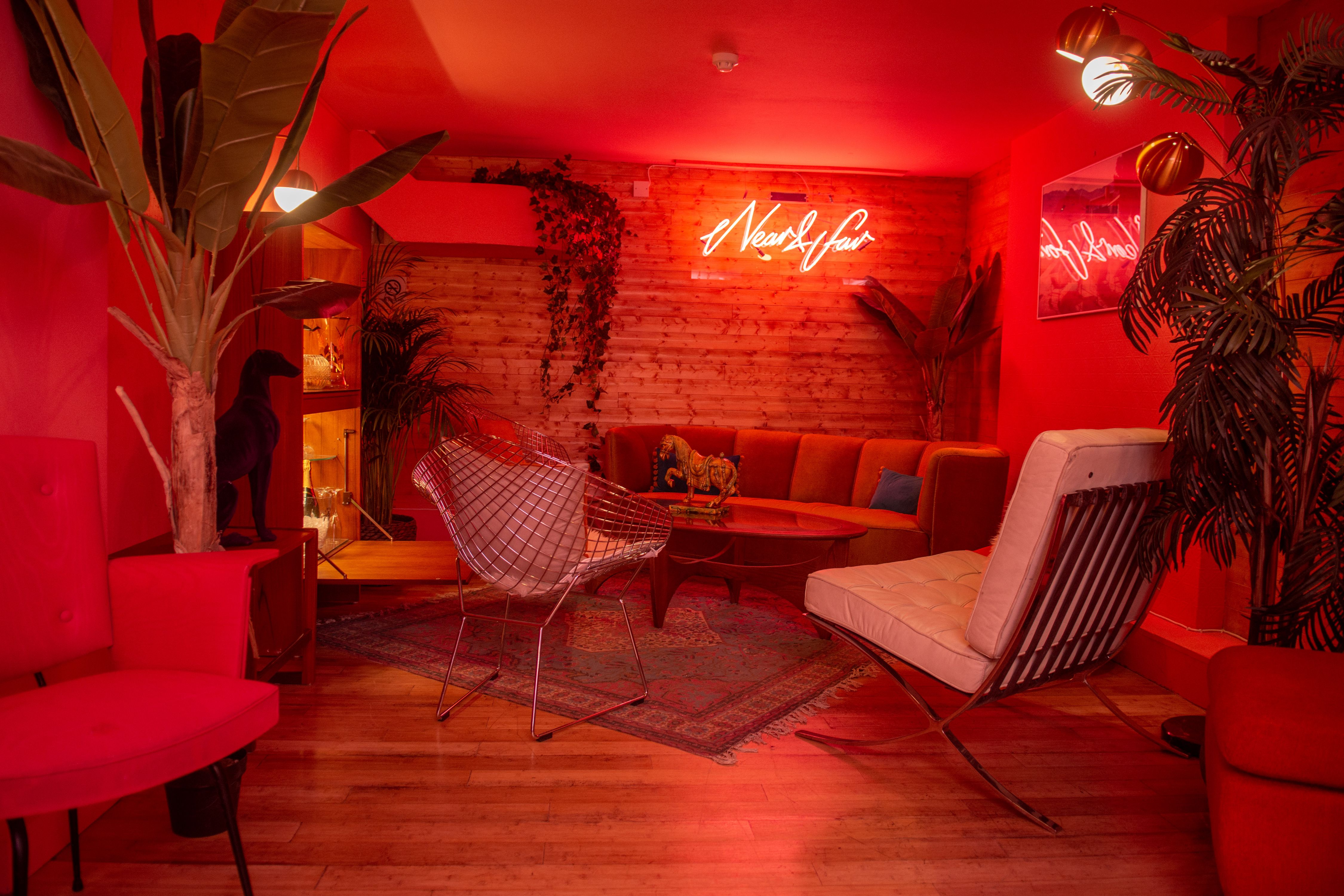 Cozy lounge in Studio 48 with warm lighting for networking events and meetings.