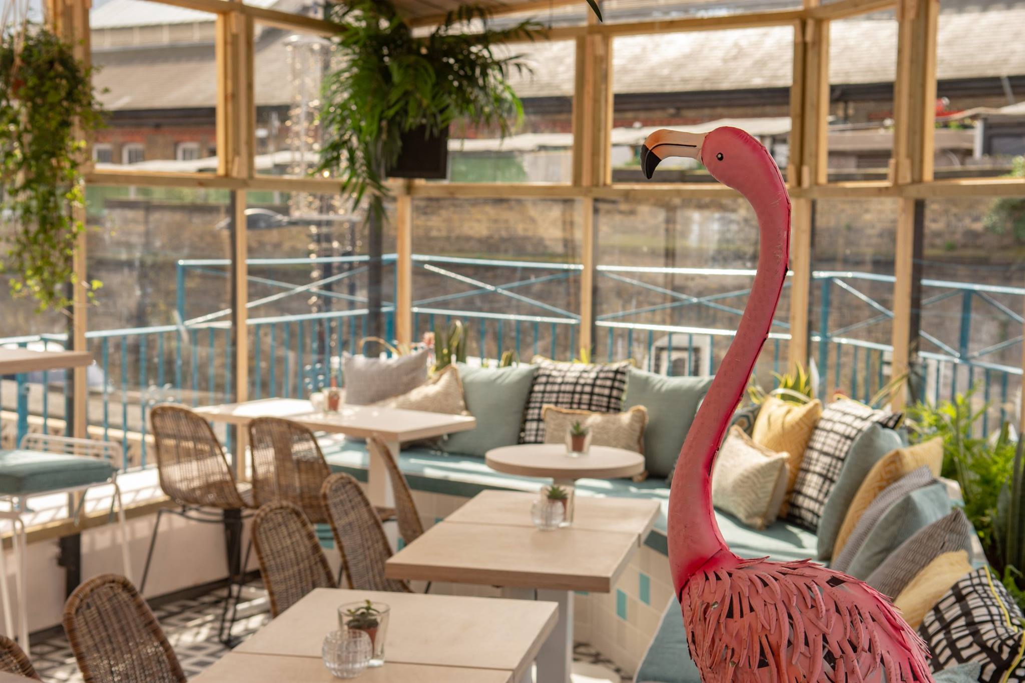 Vibrant event space in Studio 48 with stylish decor and playful flamingo for gatherings.