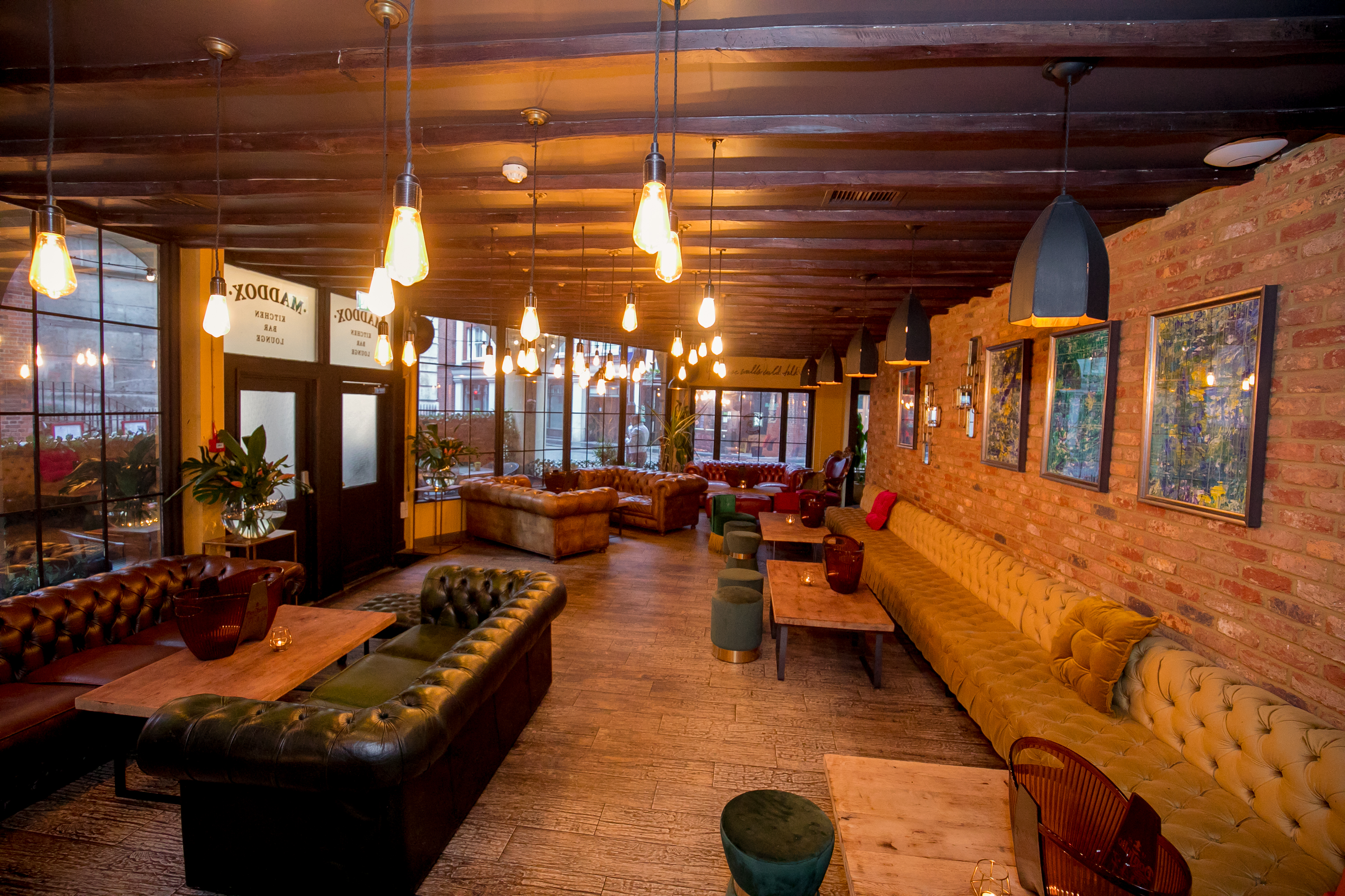 Stylish lounge at Wilfred's Bar, ideal for networking events and casual meetings.