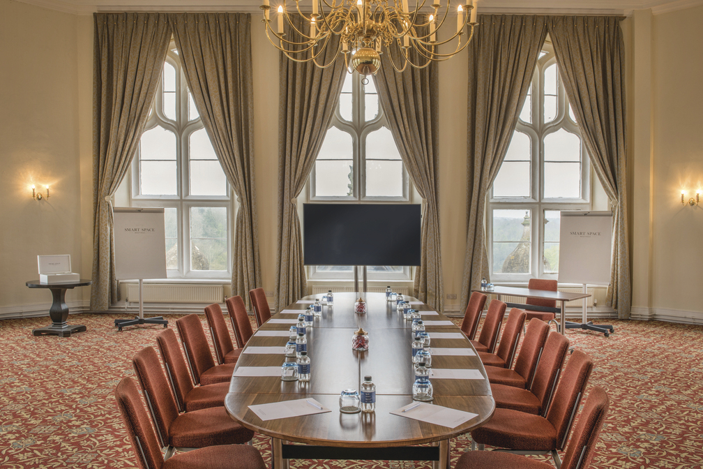 Elegant meeting room at De Vere Tortworth Court for corporate events and presentations.