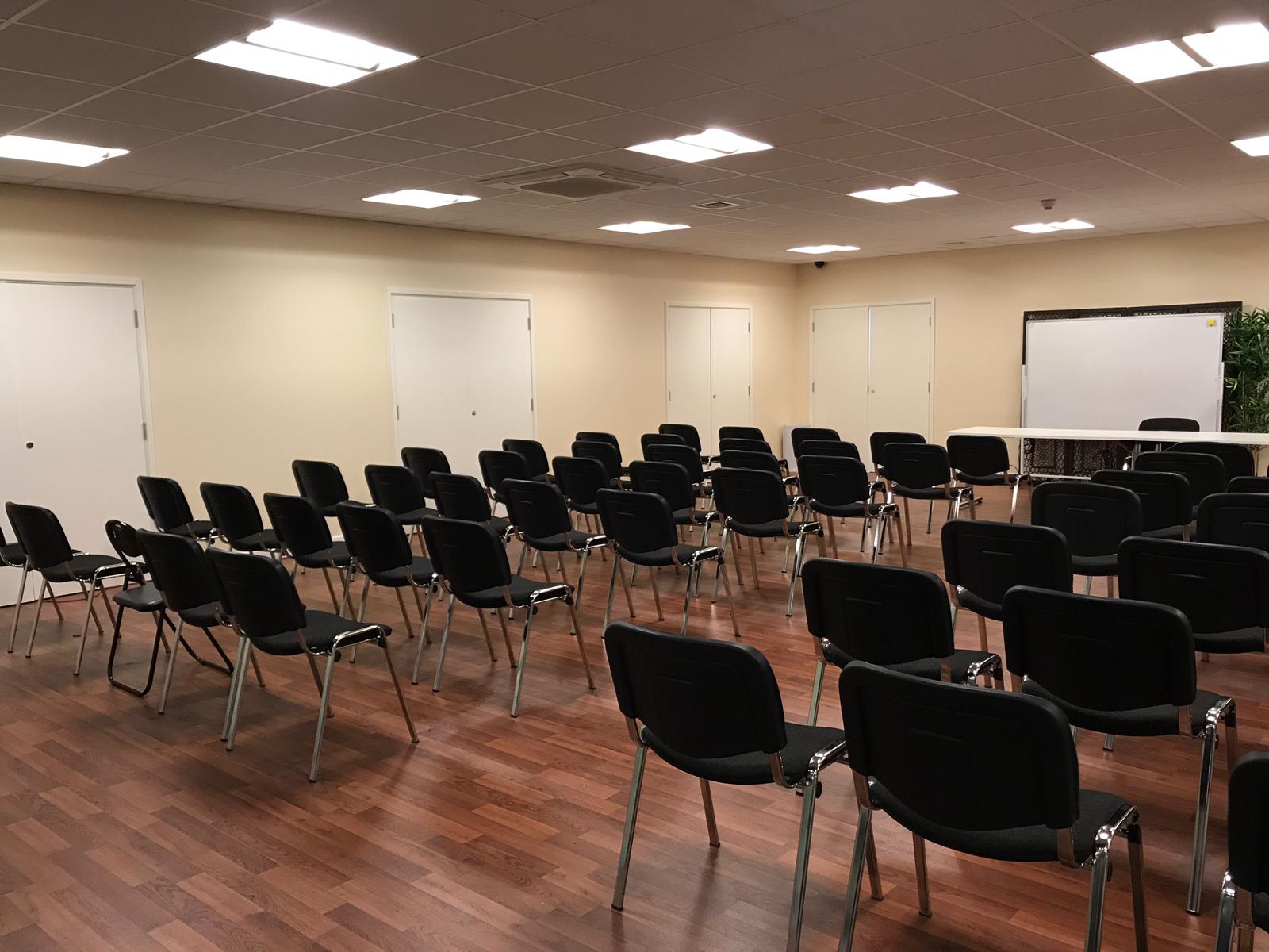 Conference Hall Room at The Dockside, organized for a presentation or workshop.
