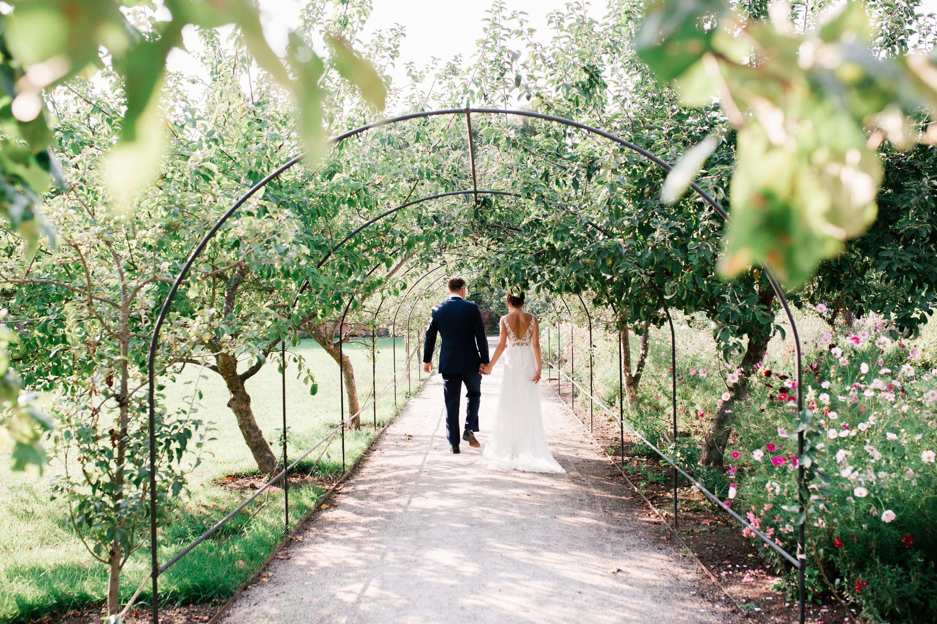 Walled Garden at Fulham Palace: lush pathway ideal for weddings and romantic events.