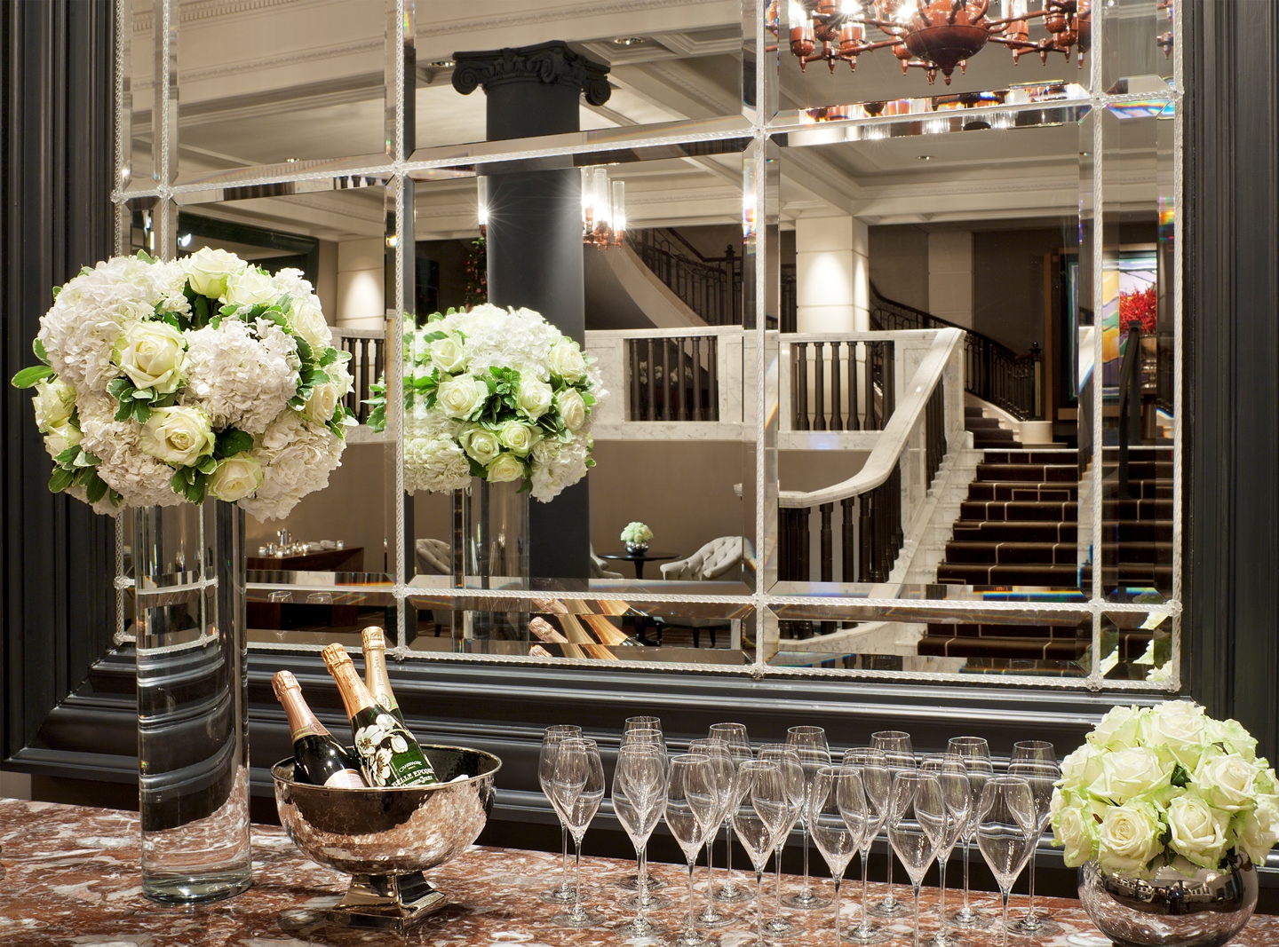Elegant Grand Ballroom at Rosewood London with floral decor, perfect for upscale events.