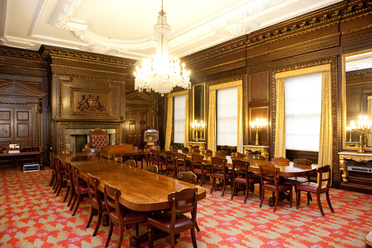 Elegant meeting room in Skinners' Hall with wooden table, perfect for corporate events.