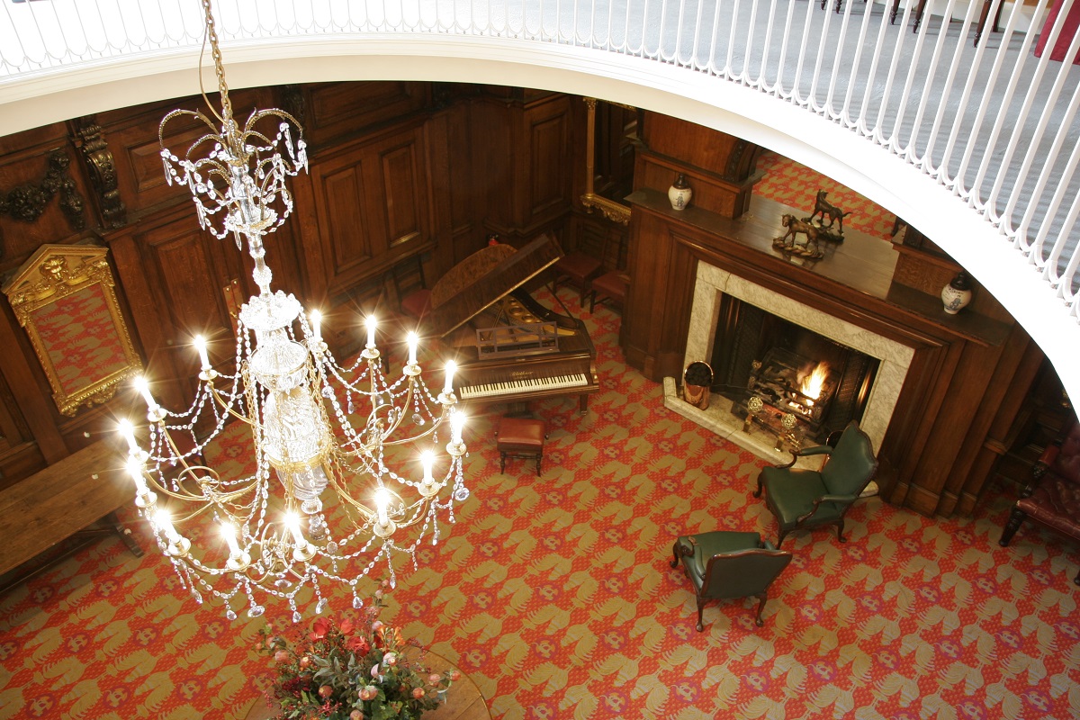 Elegant Skinners' Hall venue with grand chandelier, ideal for upscale events and gatherings.