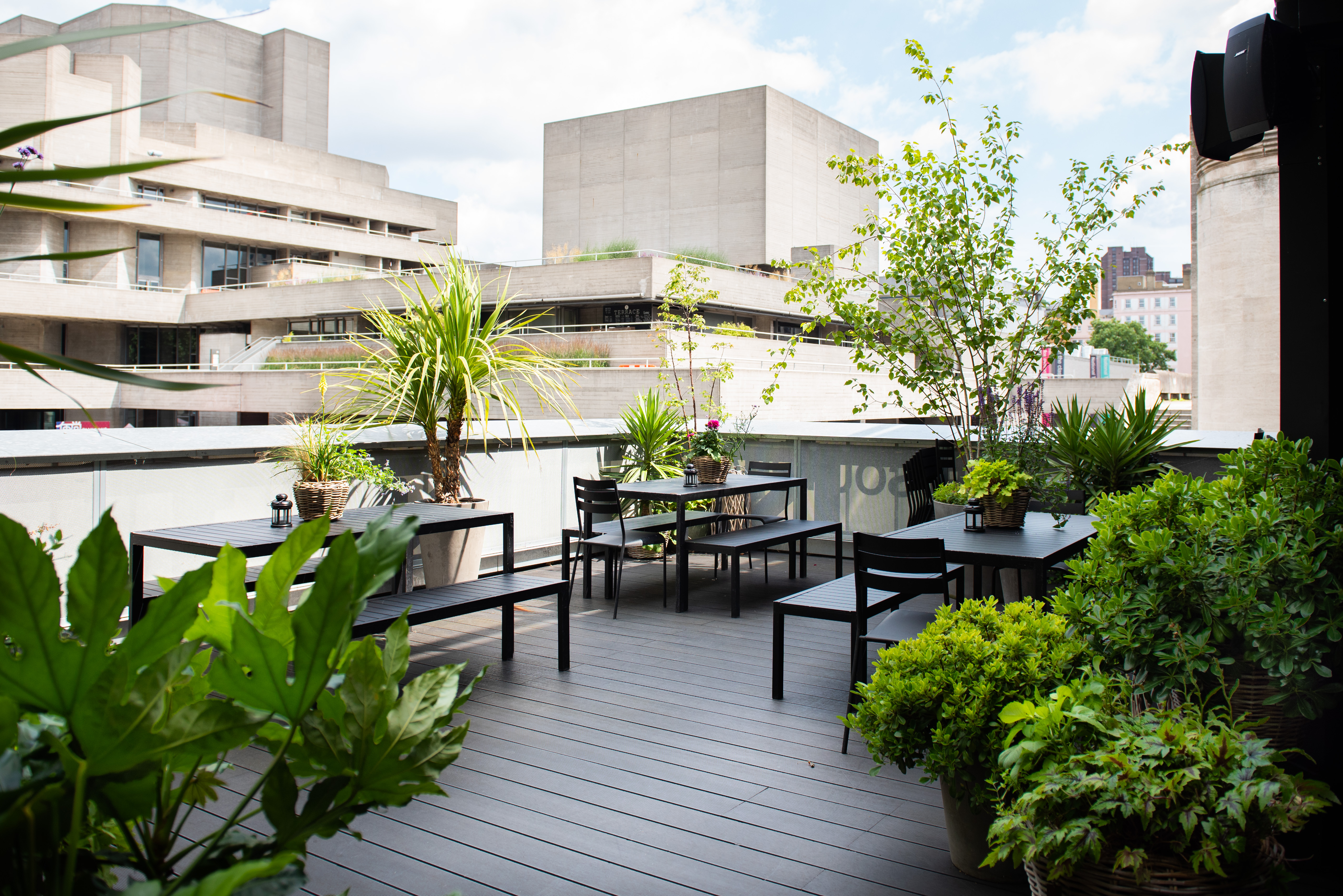 Stylish outdoor terrace at Balcony Bar, perfect for networking events and casual meetings.