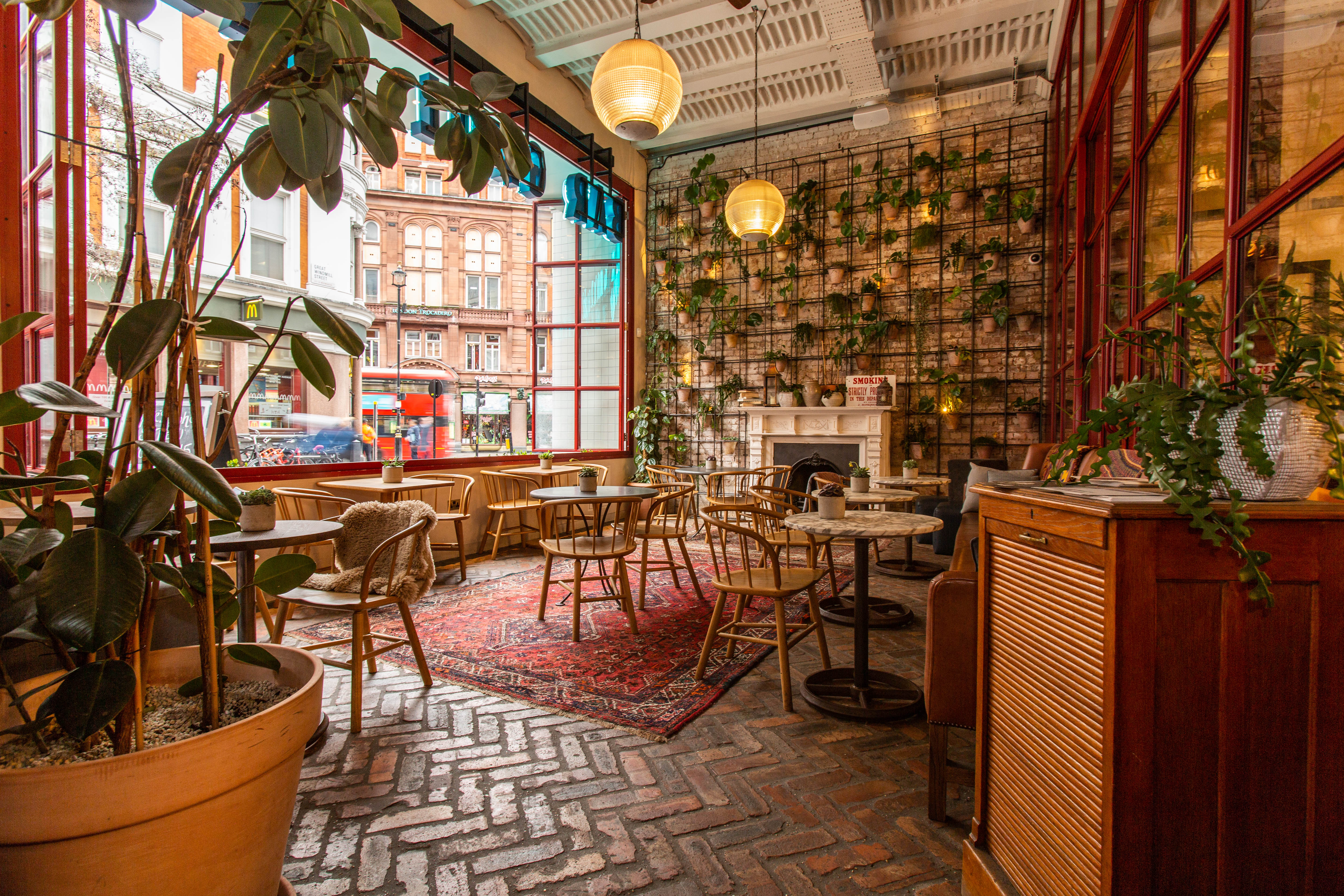 Stylish venue with large windows for intimate meetings and small events in Soho.