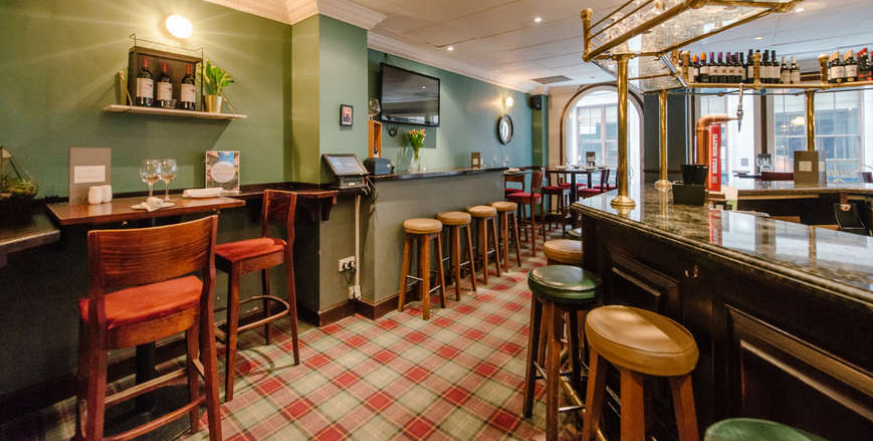 Cozy bar venue at Number 25 Birchin Lane, ideal for networking and informal meetings.