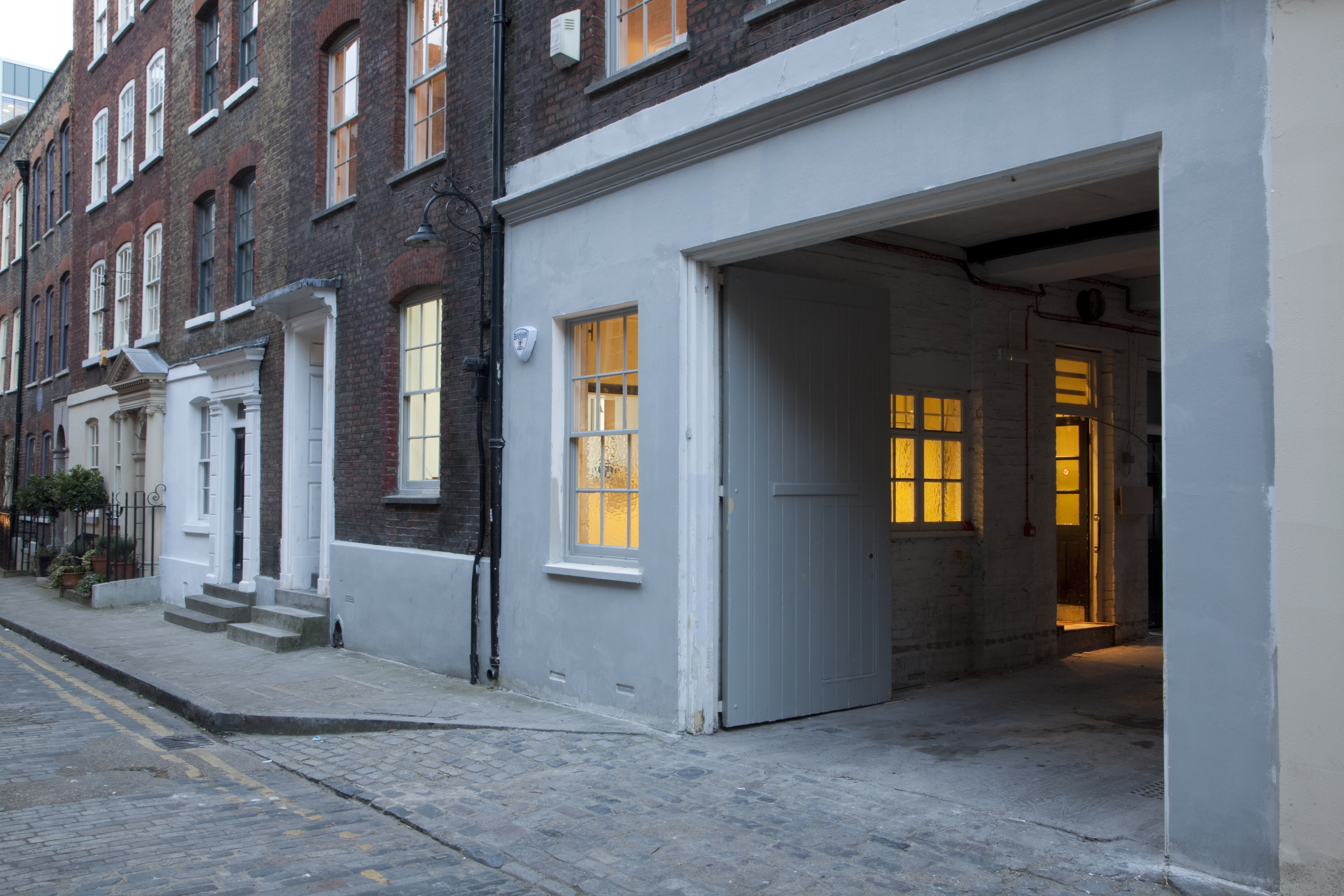 Charming venue with warm lighting for creative events and team-building activities.