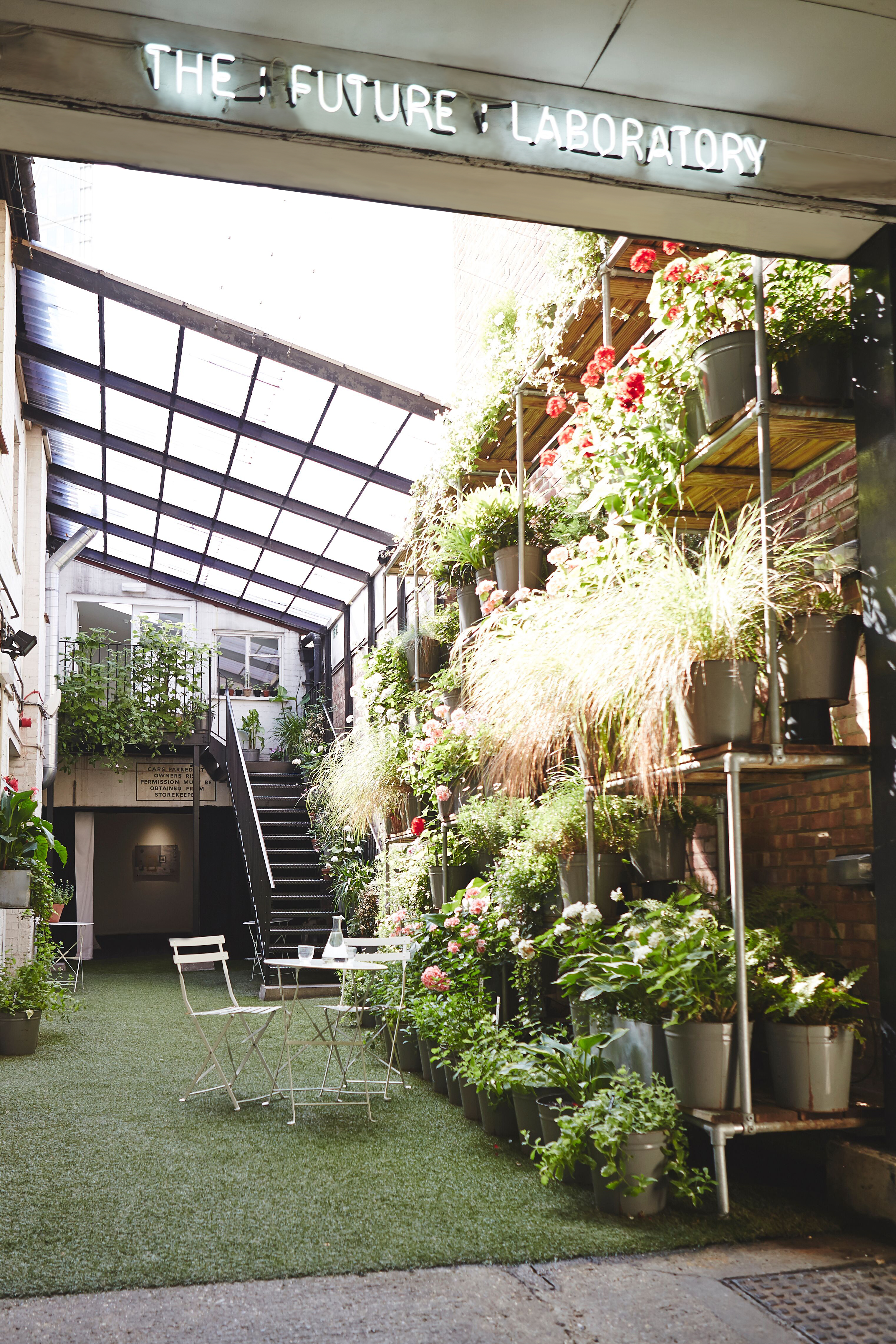 Urban garden venue with lush greenery for team retreats and intimate events.