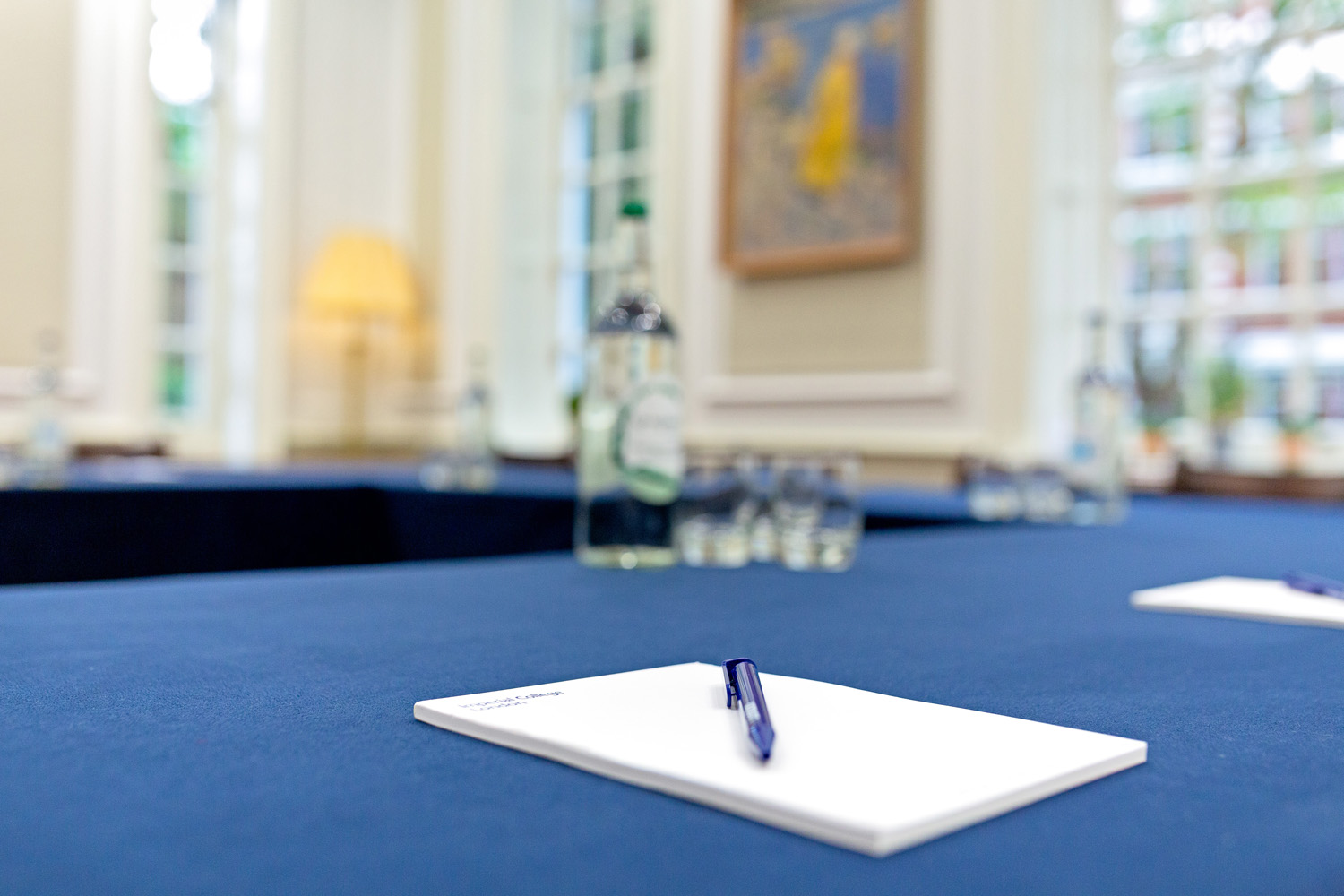 Meeting room at Imperial Venues with blue tablecloth, ideal for conferences and events.