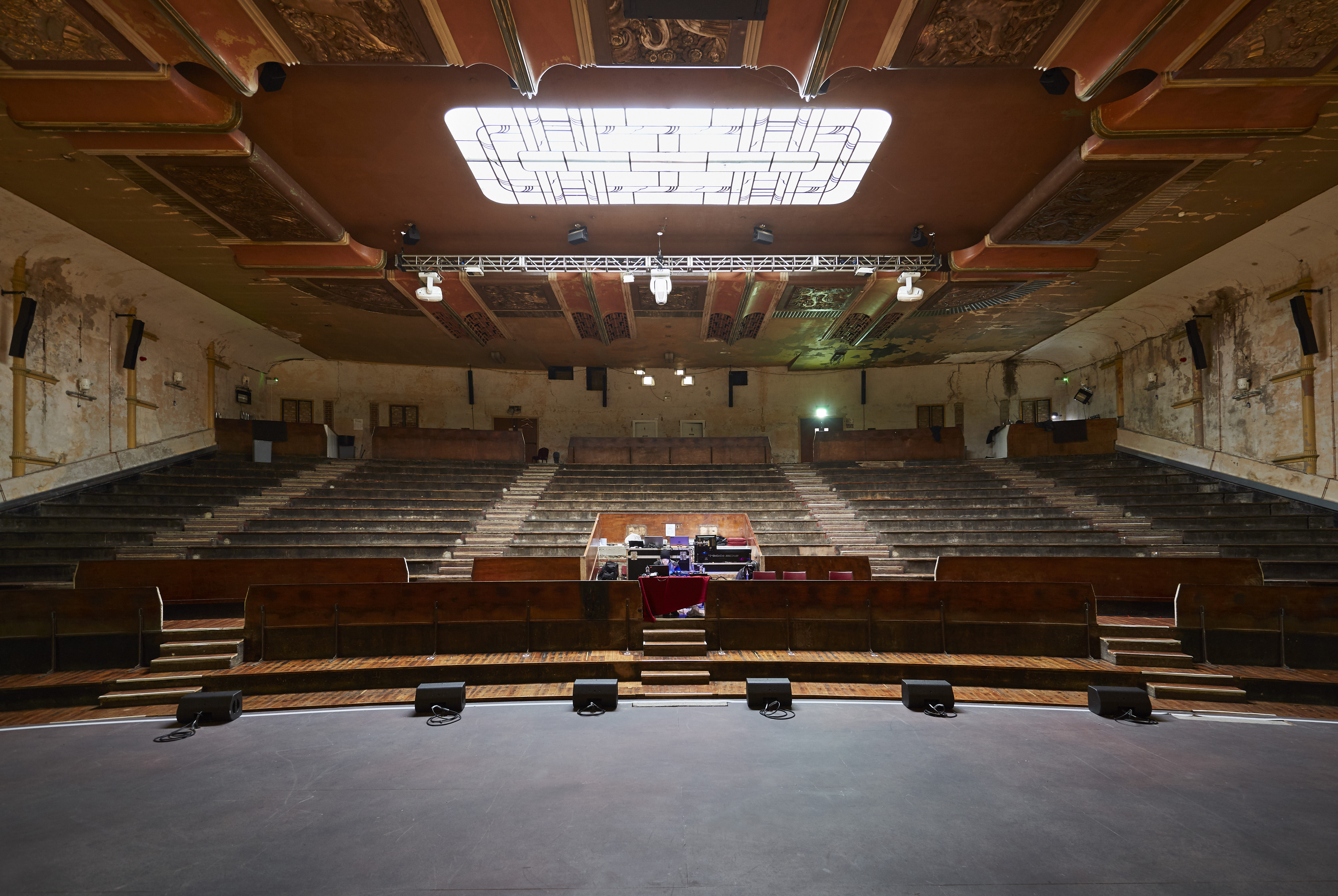 Vintage auditorium with tiered seating, ideal for conferences and performances.