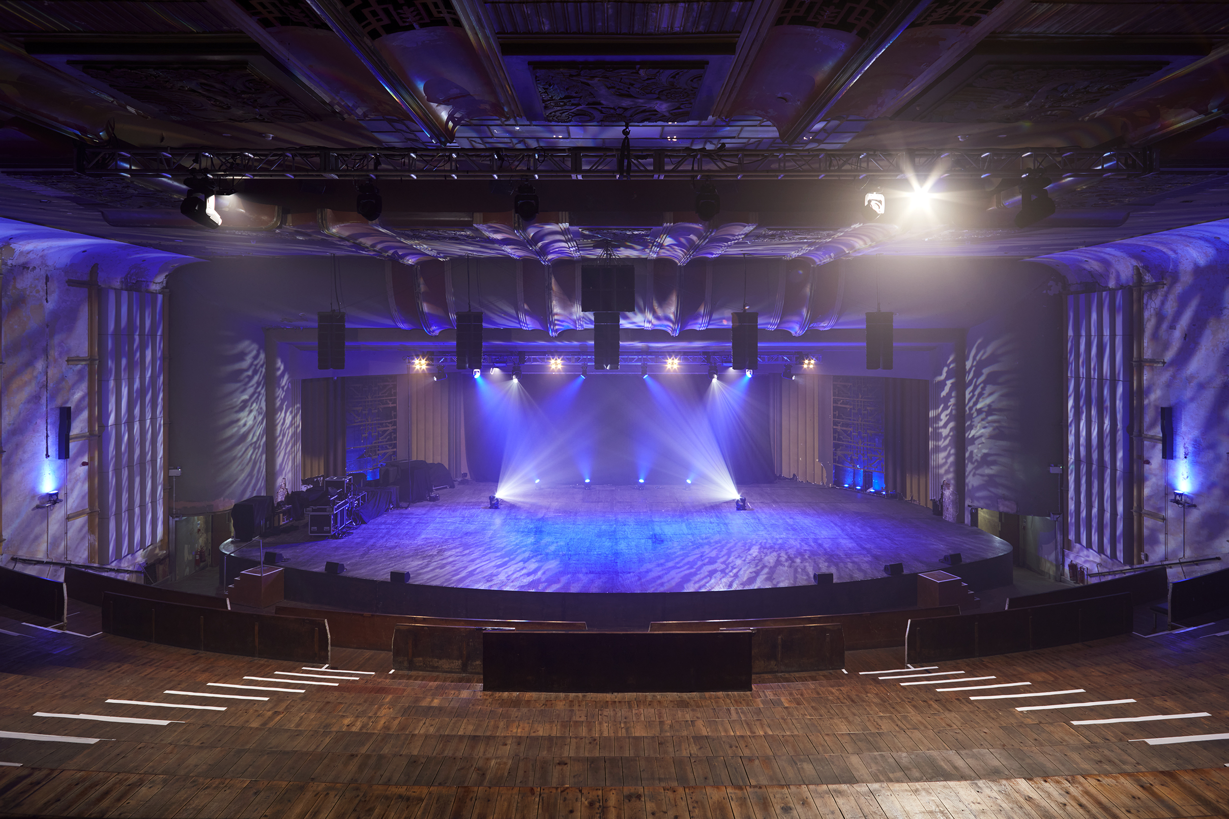 Versatile EartH theatre with tiered seating for dynamic events and performances.