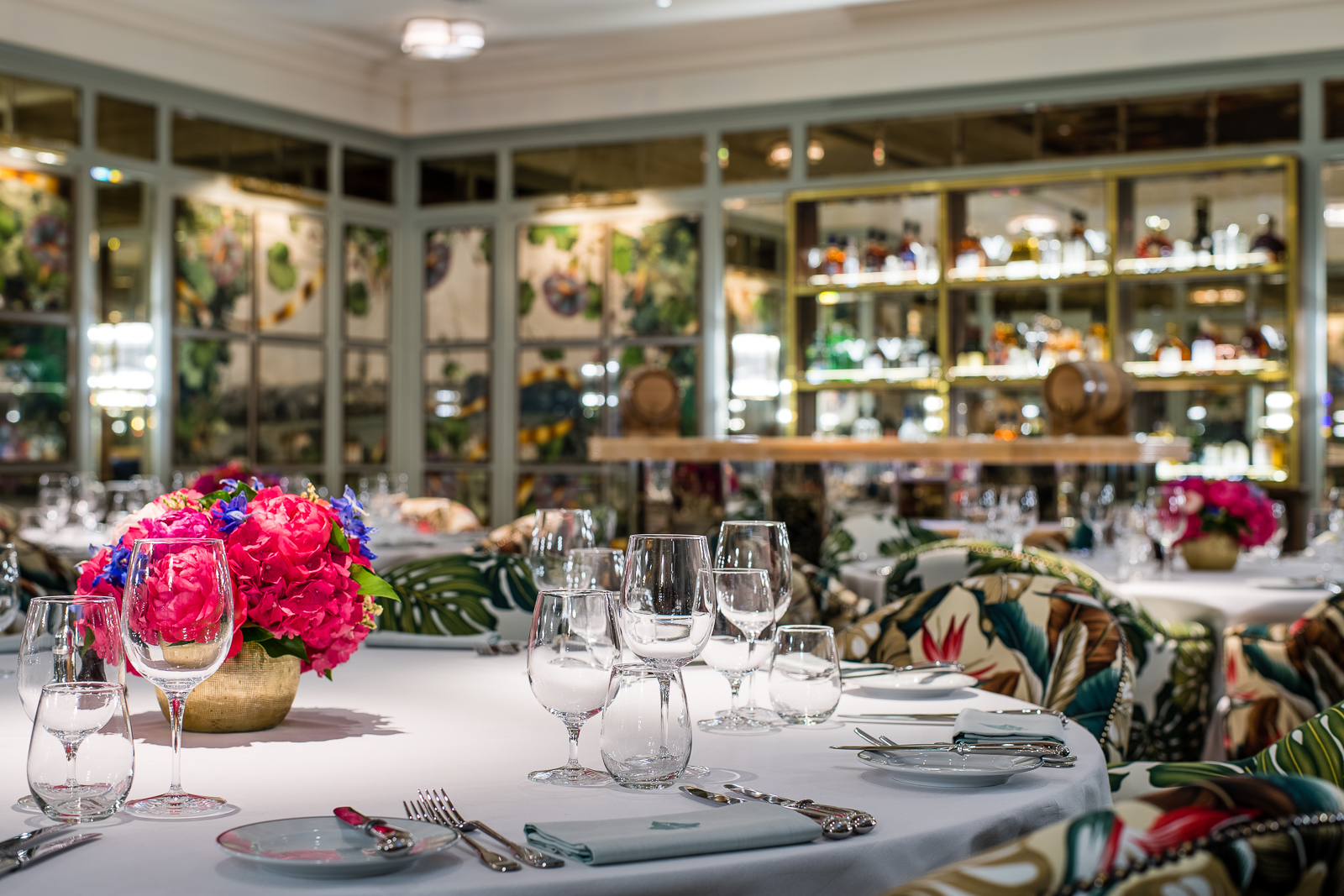 Elegant dining room with floral decor, perfect for upscale events and corporate dinners.