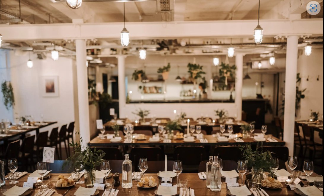 Elegant dining space for events at FARE Restaurant + Bar with sophisticated decor.