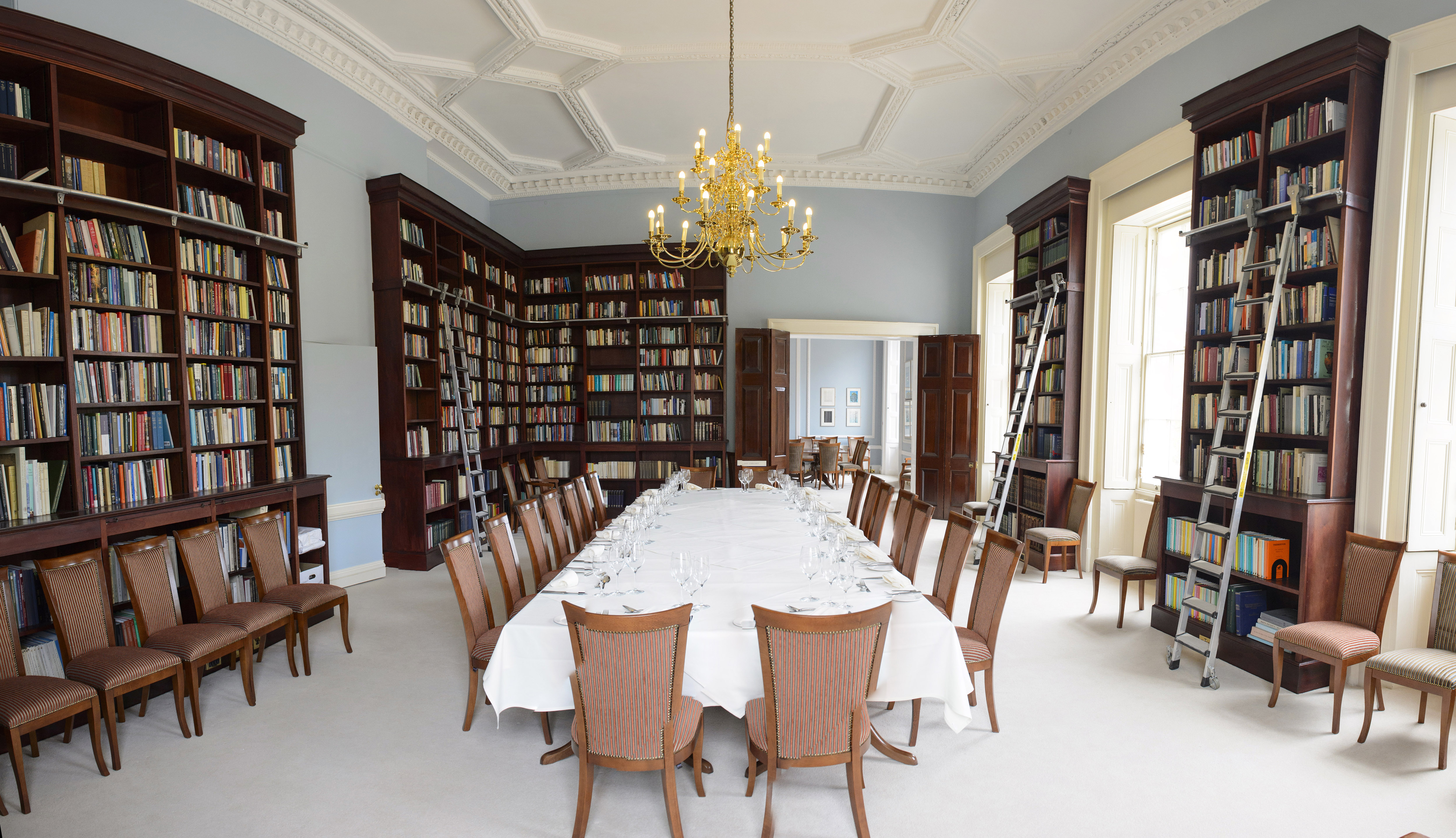 Elegant meeting space with plush chairs, ideal for corporate events and workshops.