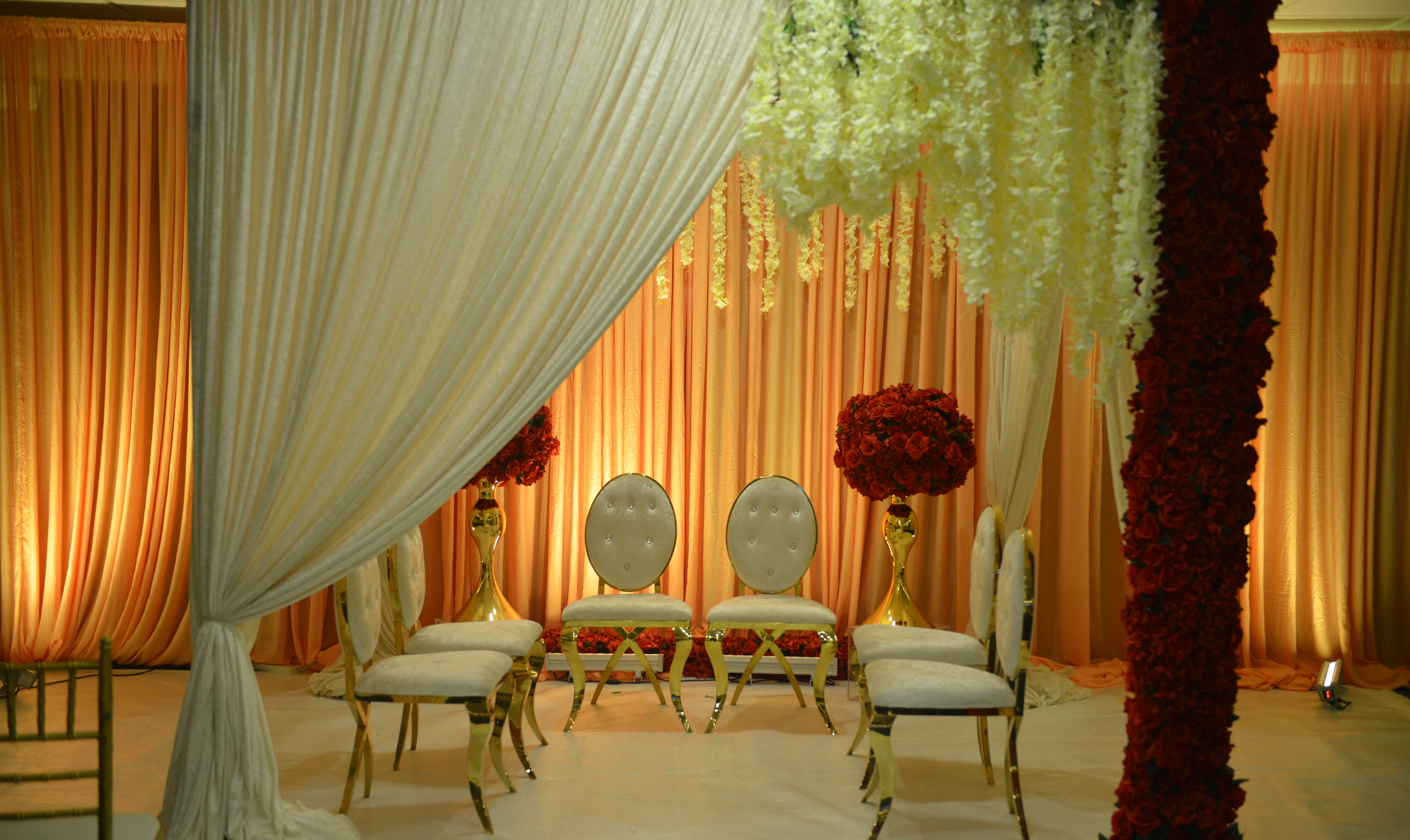 Elegant Golden Suite with floral decor, ideal for weddings and upscale events.