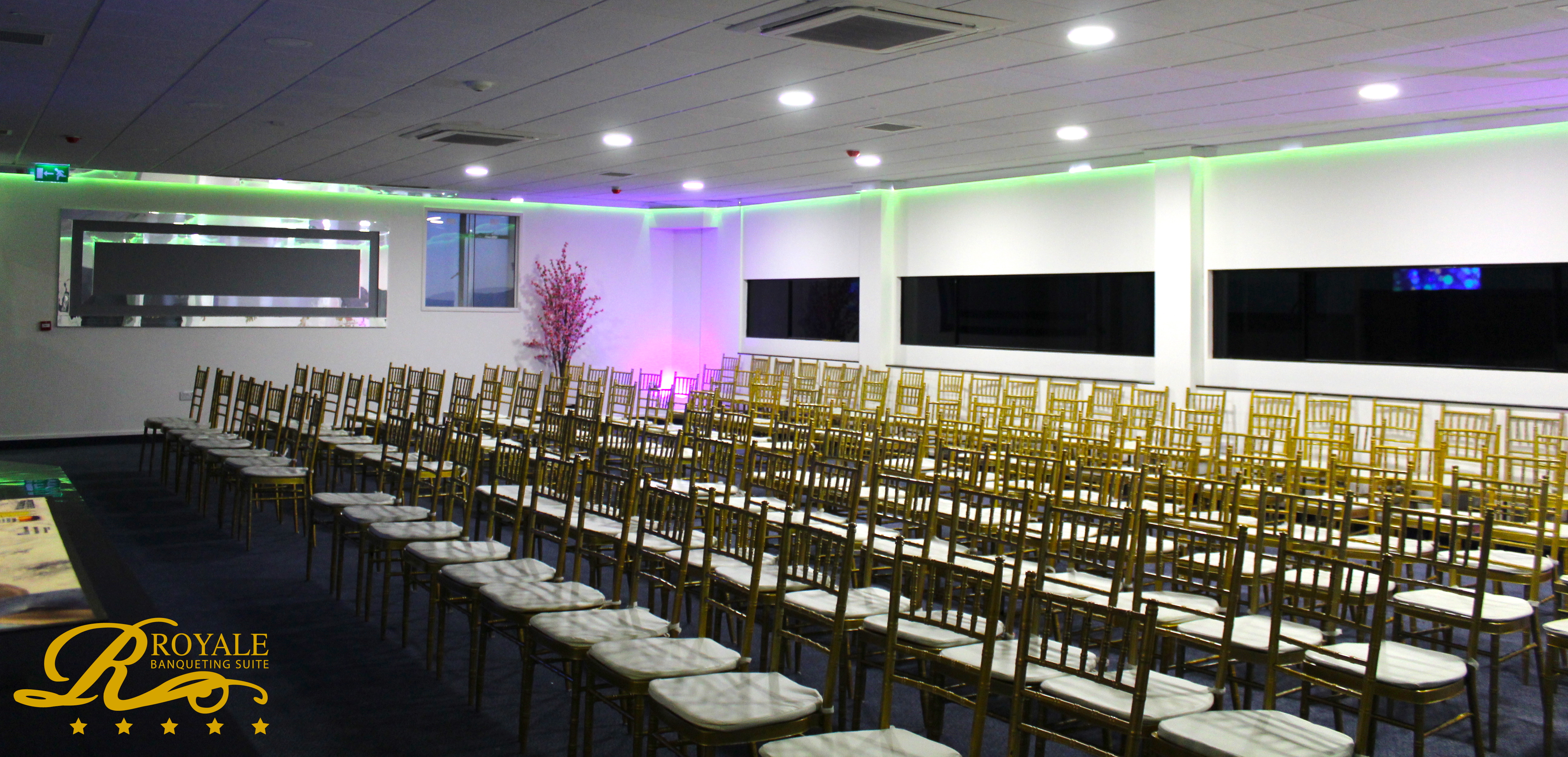 Elegant Silver Suite with gold chiavari chairs for conferences and formal events.