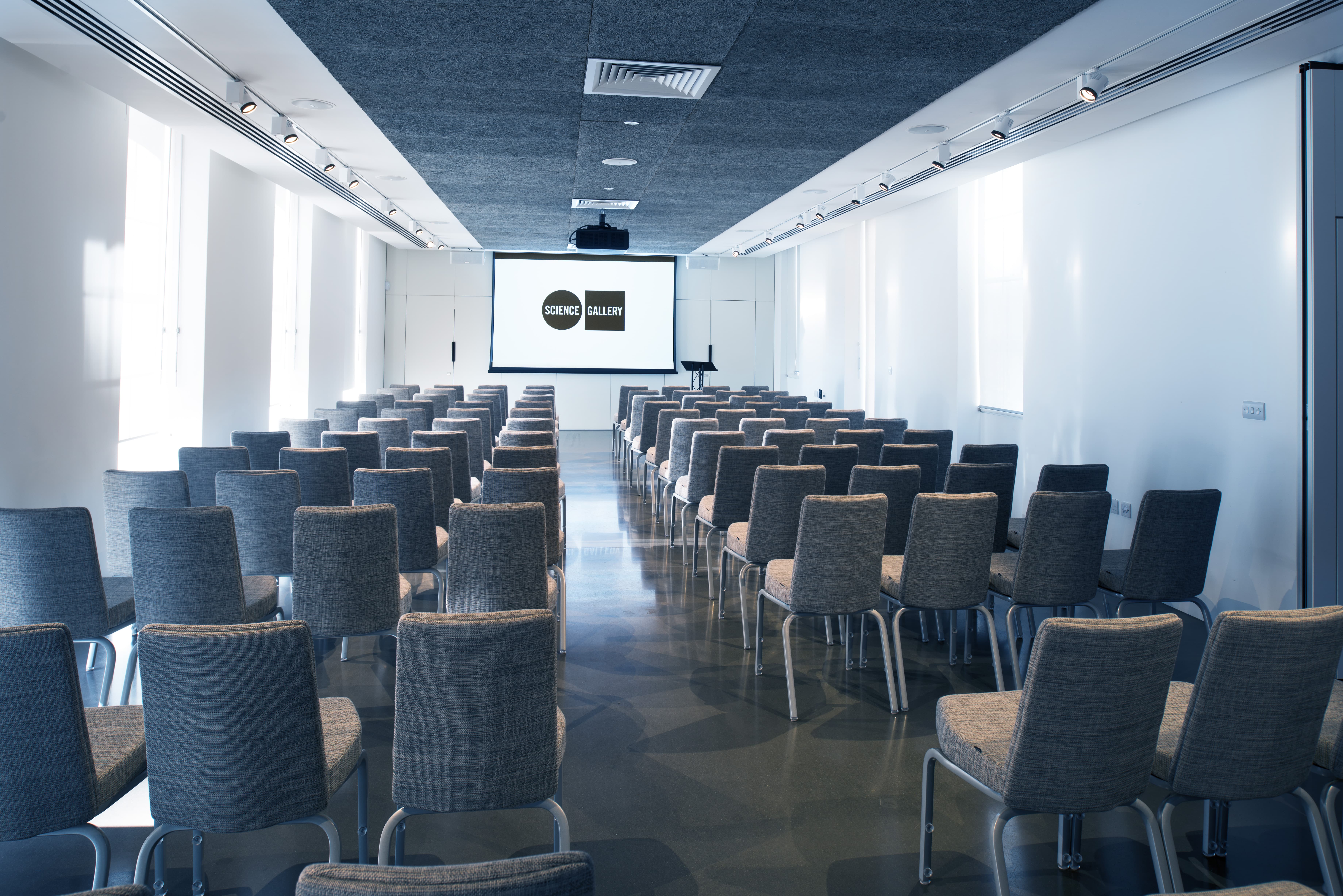Modern conference room in Science Gallery London, ready for presentations and workshops.
