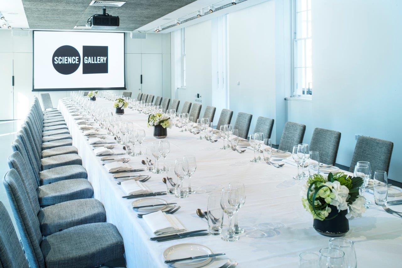 Modern event space in Science Gallery London, set for corporate gatherings with elegant decor.