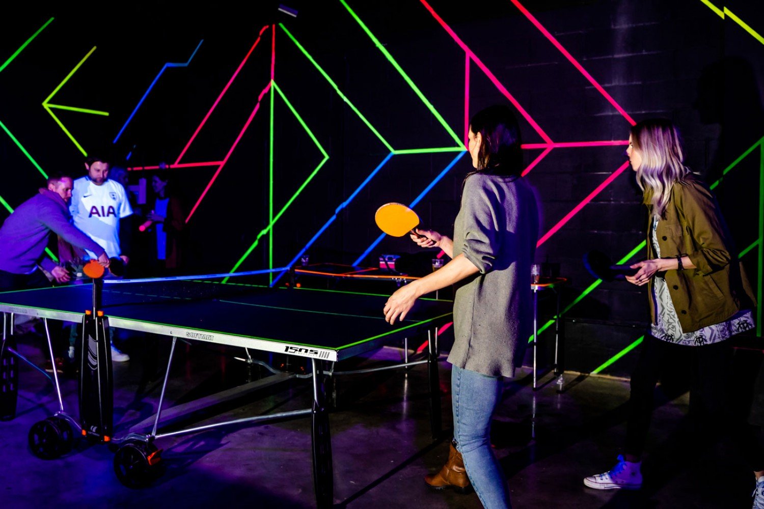 Playbox Room at Boxpark Wembley with ping pong setup for networking and team-building events.