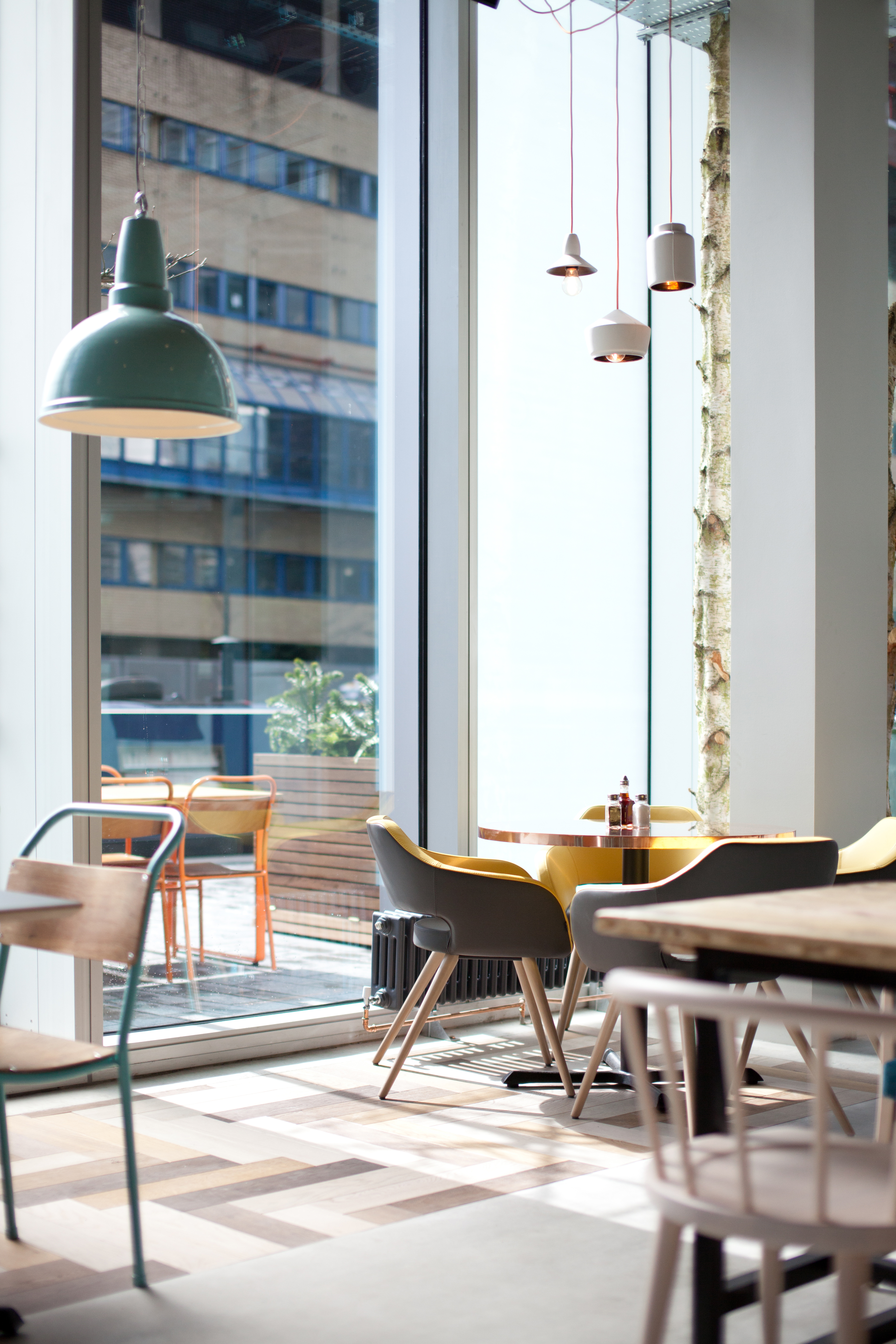 Modern meeting space at KuPP with large windows, ideal for networking events.