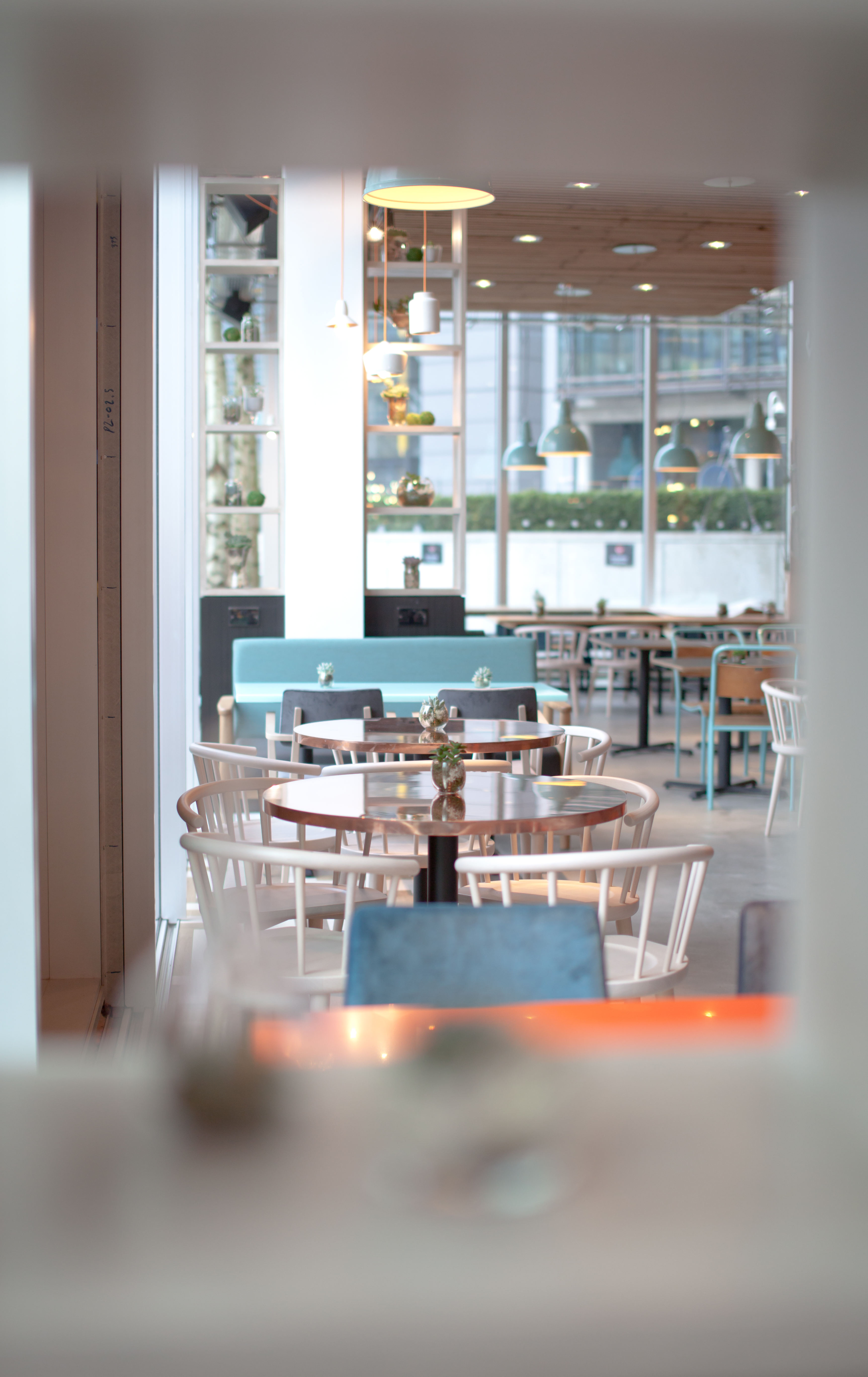 Modern dining space at KuPP, ideal for networking events and casual meetings.
