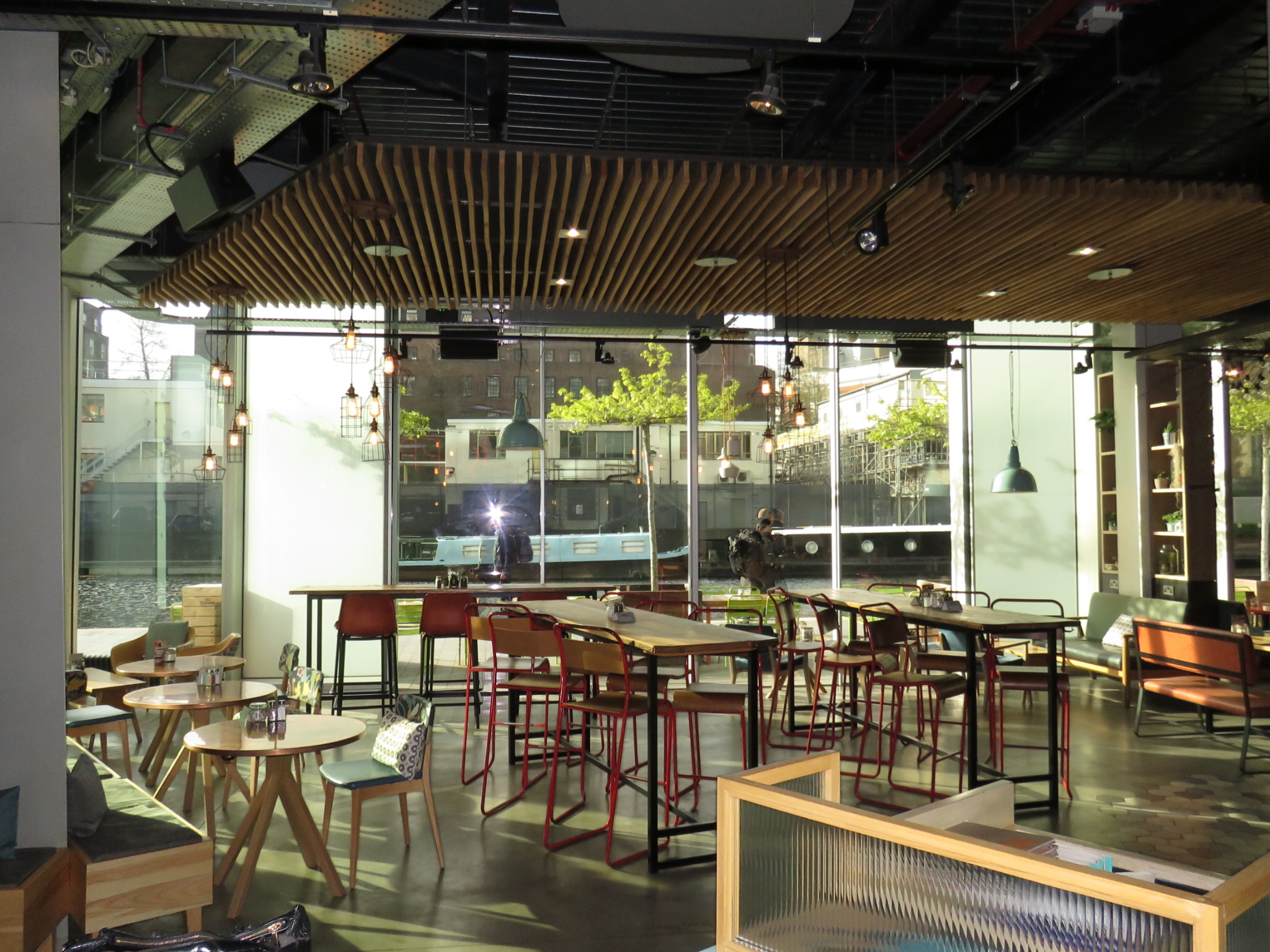 Modern event space at KuPP with natural light, ideal for networking and gatherings.