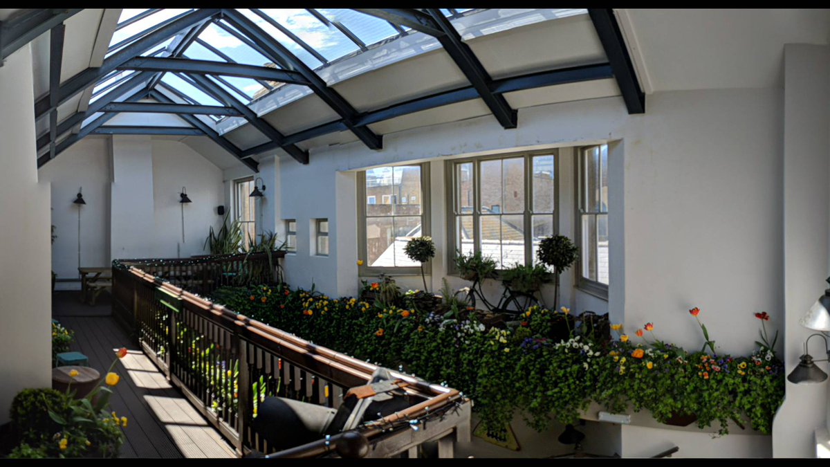 Bright event space with large windows, ideal for corporate meetings and social gatherings.