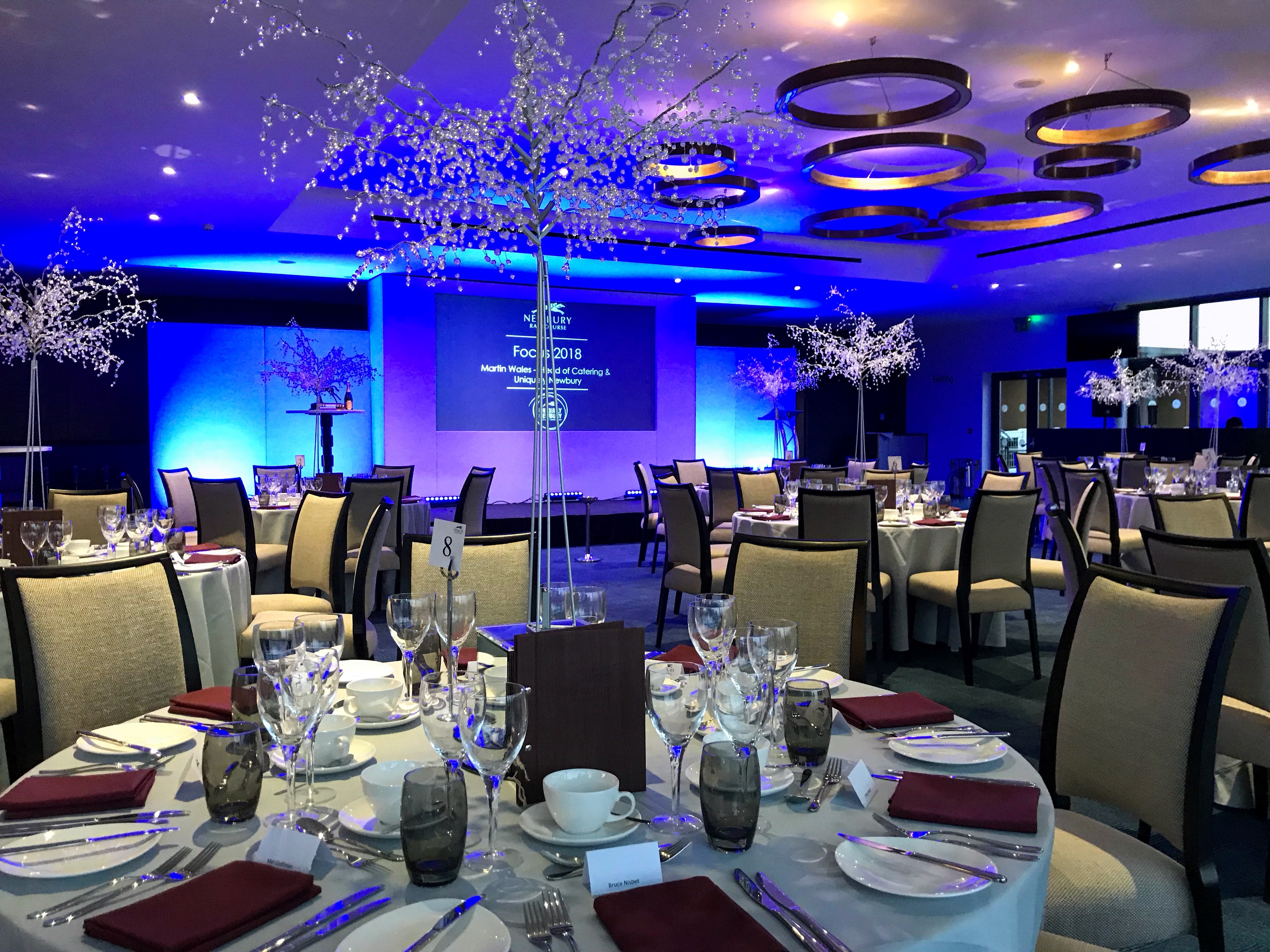 Elegant banquet room at Newbury Racecourse for corporate events and formal gatherings.