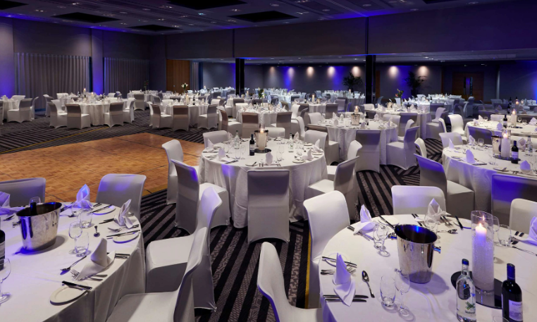Essex Suite at Radisson Blu: elegant dinner setup for corporate events and weddings.