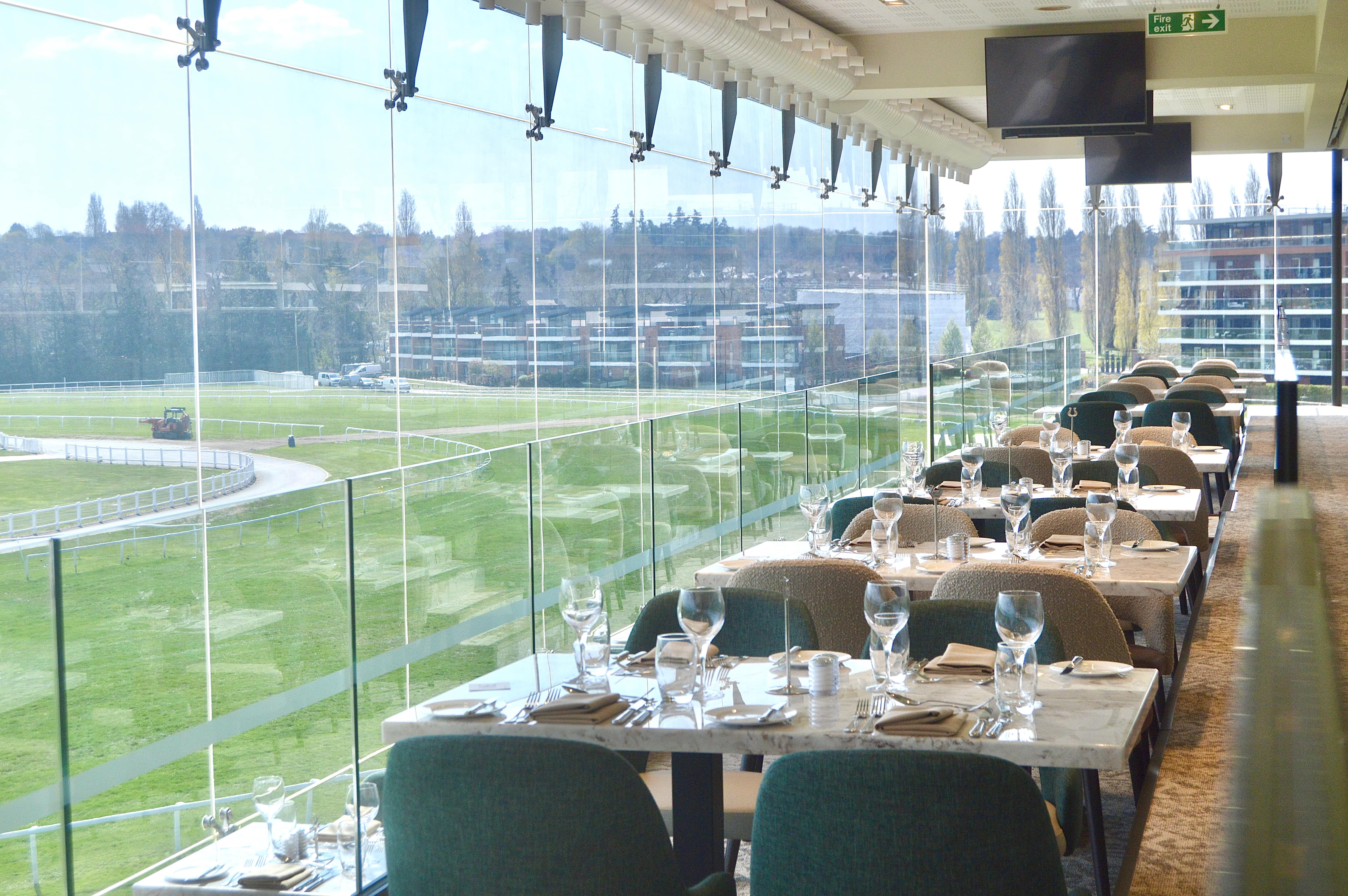 Hennessy Suite at Newbury Racecourse: elegant dining space for corporate events and gatherings.