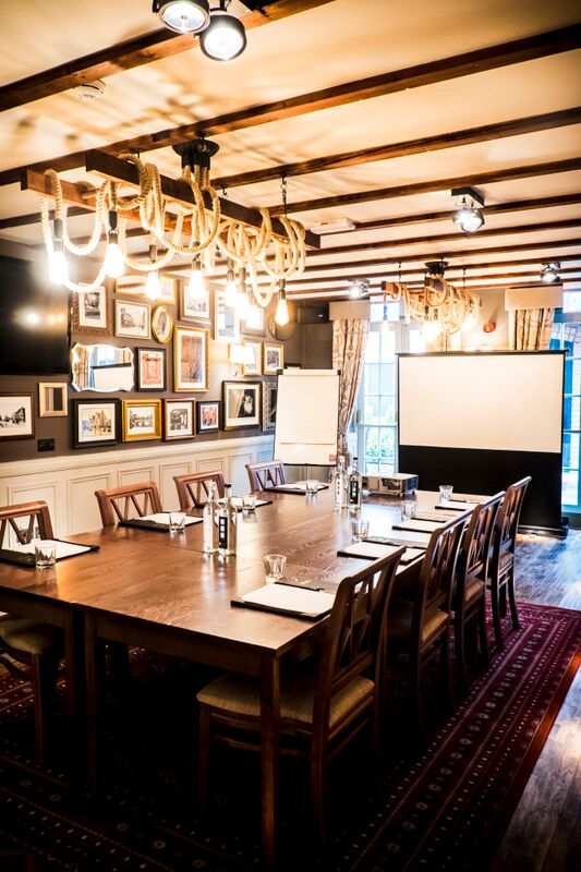Capulet meeting room at White Swan Hotel, rustic decor for intimate gatherings.