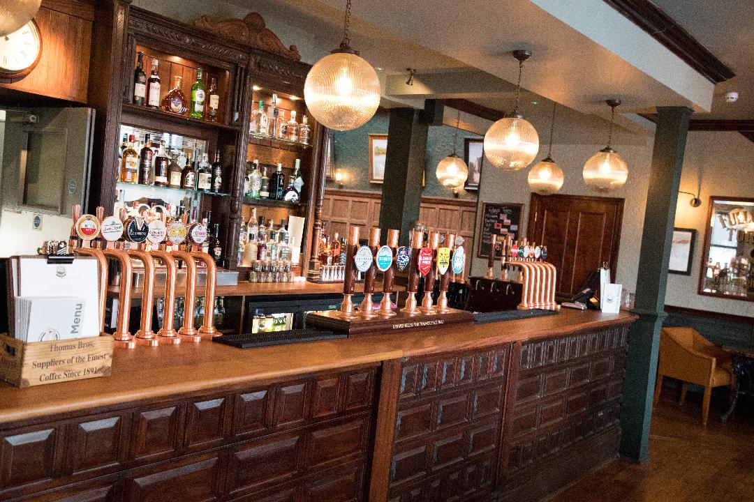 Balcony Bar at The Swan, inviting wood decor for networking events and receptions.