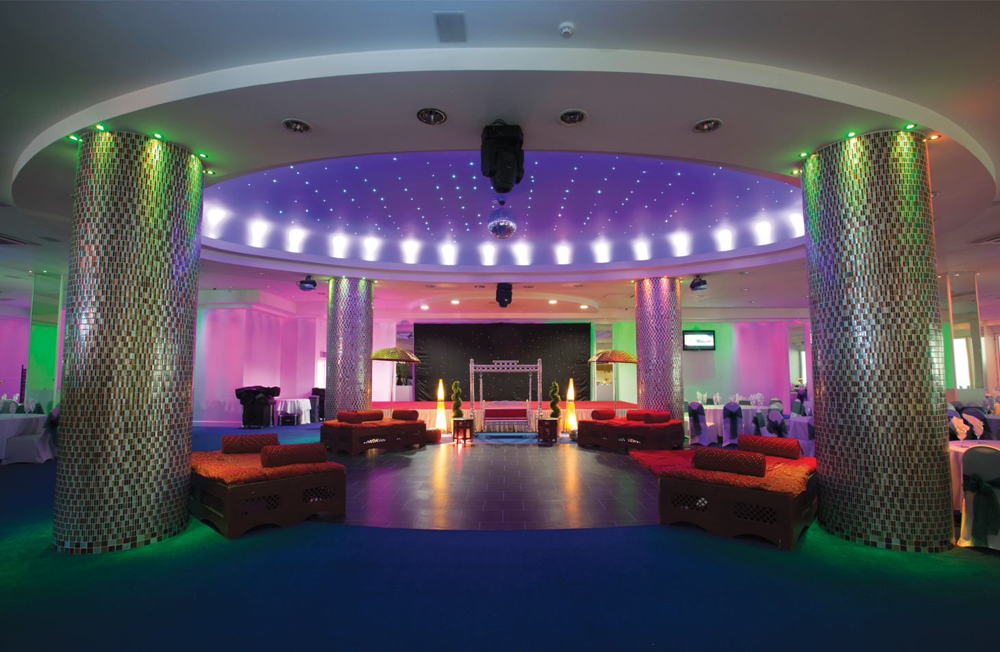 Nightclub-style Praba Banqueting Suite with LED lighting for corporate events and gala parties.