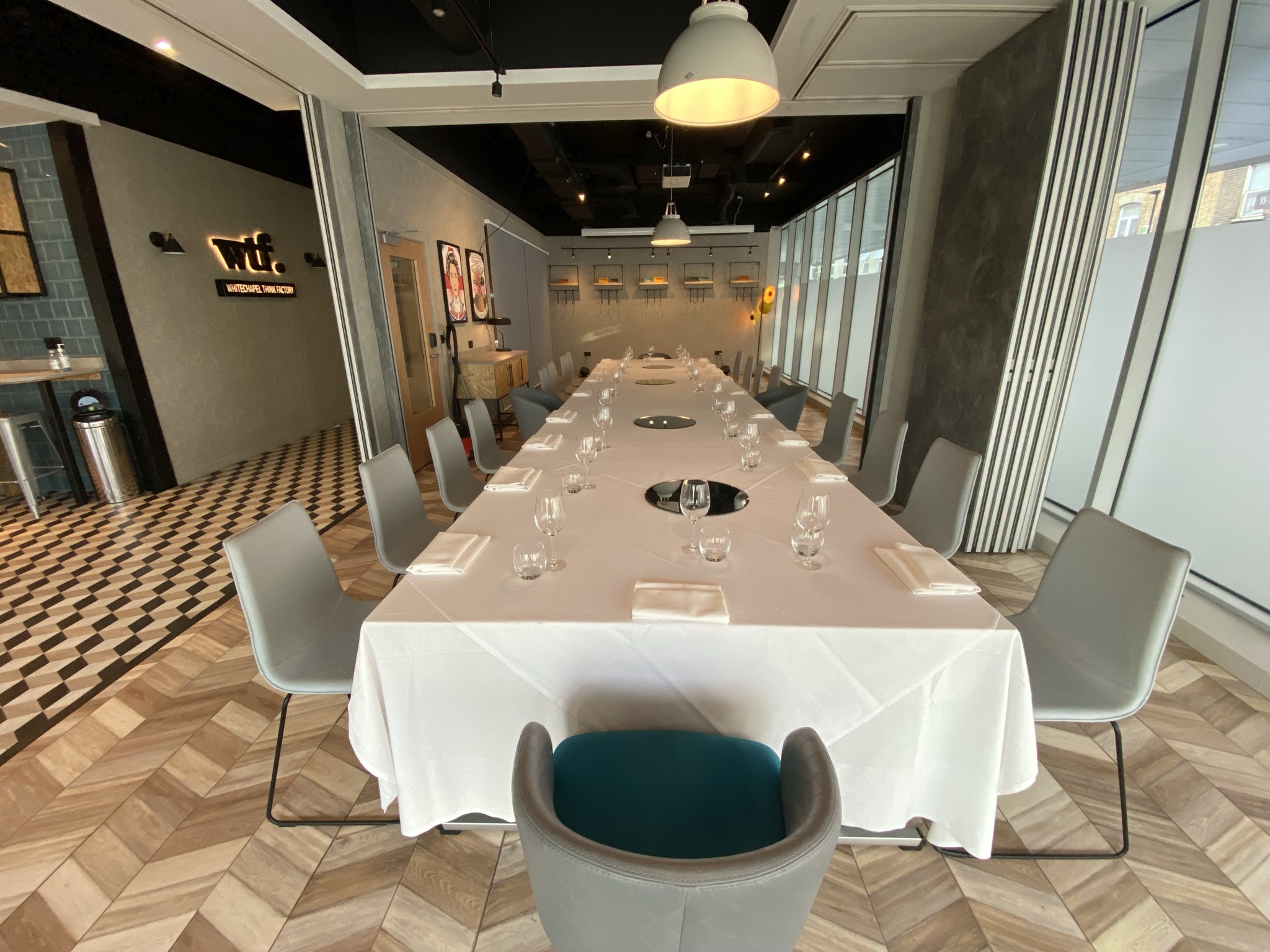 Whitechapel Think Factory meeting space with elegant table for corporate events.