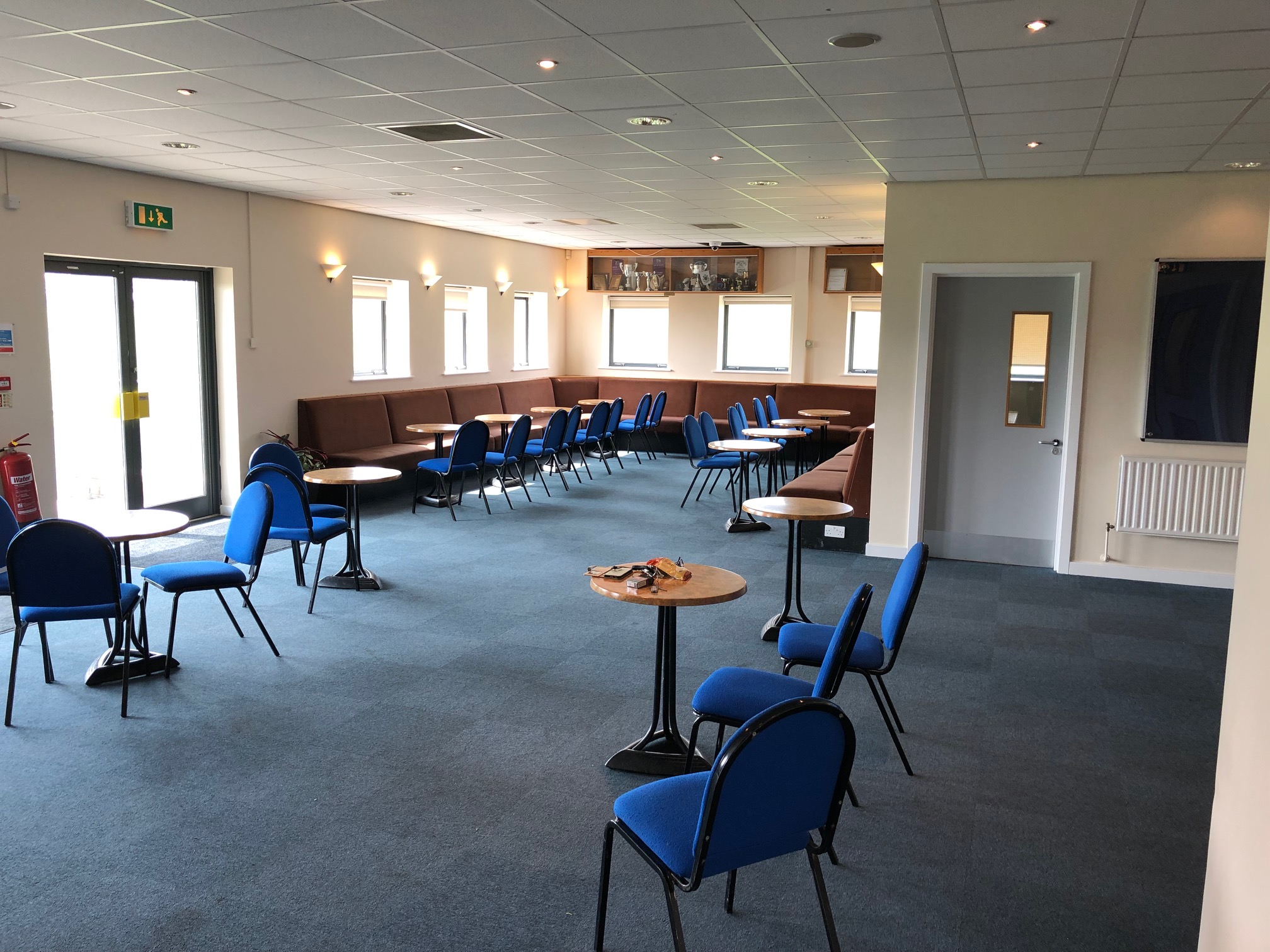 Versatile bar area in DRAM Centre, ideal for meetings and events with natural light.