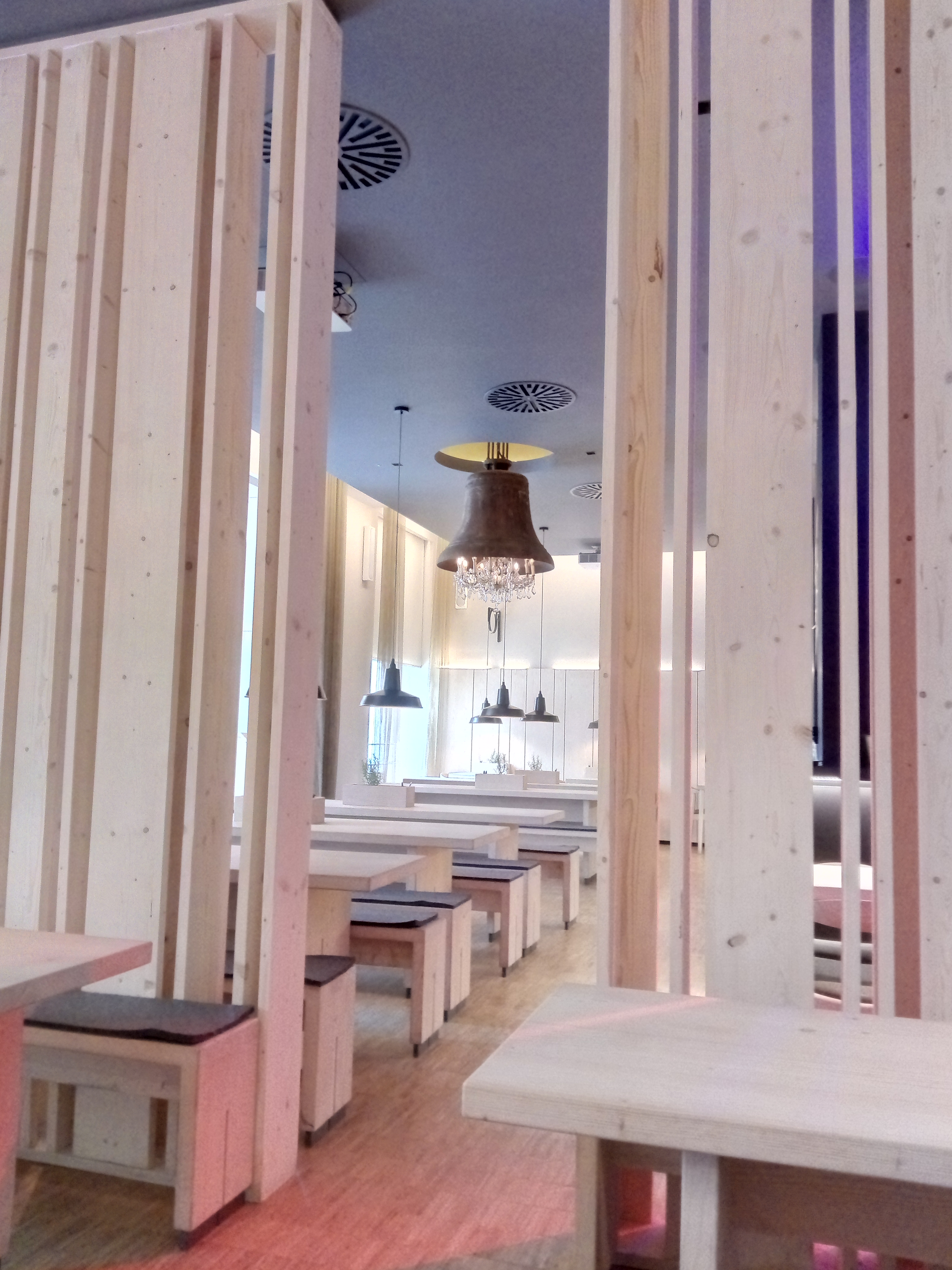 Modern event space with wood accents at Stein's Berlin Restaurant for meetings and gatherings.