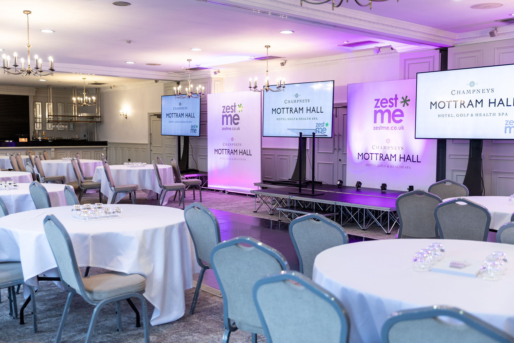 St Andrews Suite at Mottram Hall, elegant conference setup with modern AV equipment.