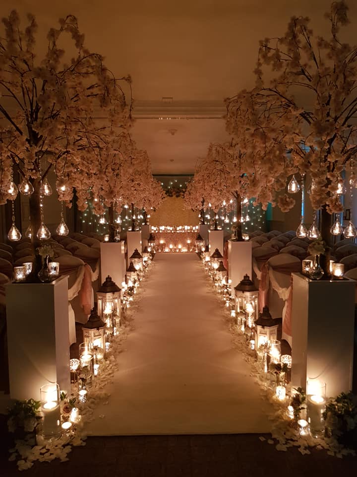 St Andrews Suite at Mottram Hall, elegant wedding venue with cherry blossom trees.