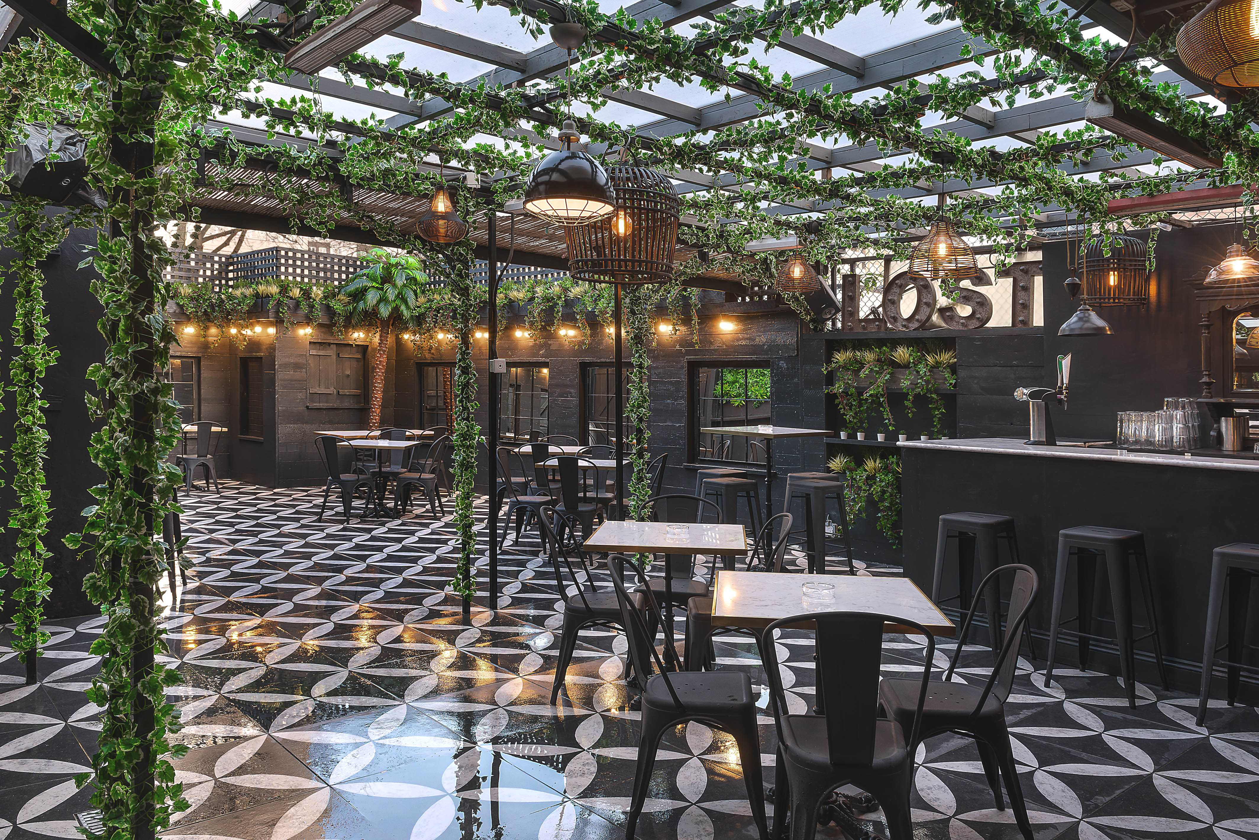 Stylish Lost Garden event space with modern design and lush greenery for gatherings.